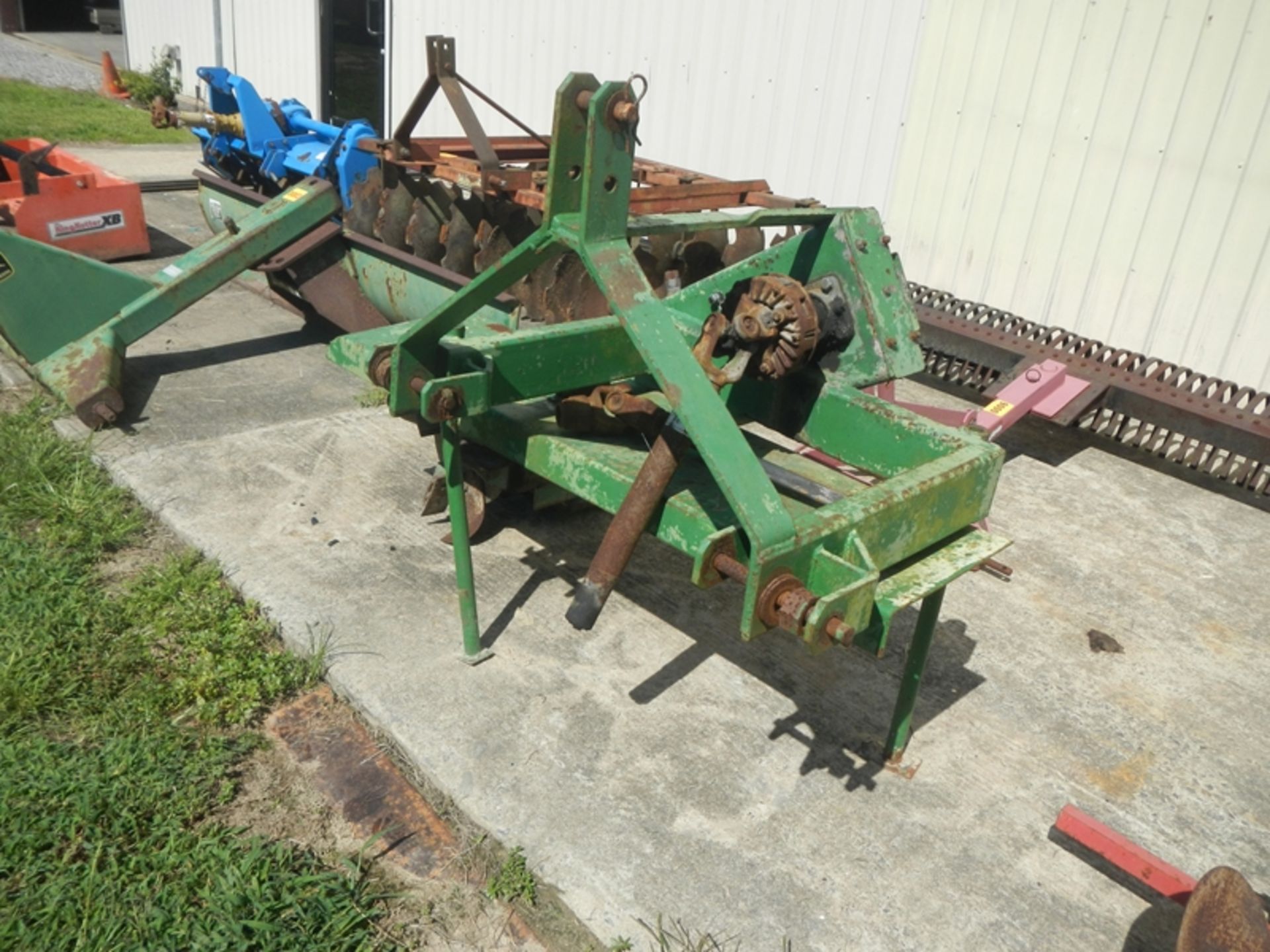 Reddick off set trencher has been modified so you can change bearings without removing bottom shaft