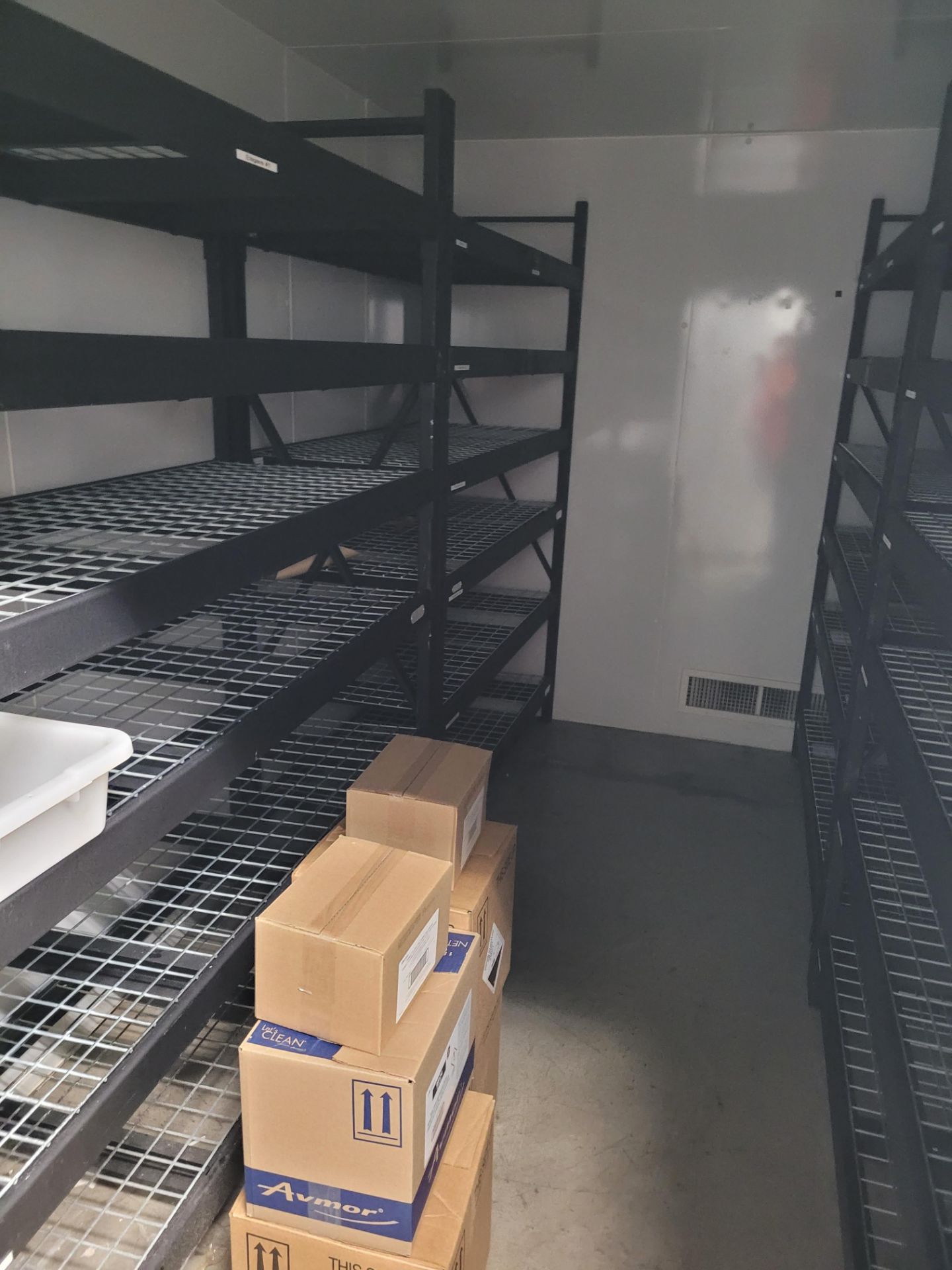 Lot of (4) sections of metal racking with grill shelves, (6) uprights, (24) beams, (24) grill shelve
