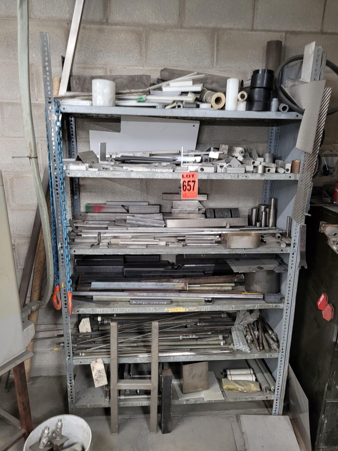 Lot of metal shelving and contents of aluminum, stainless steel, parts, chains