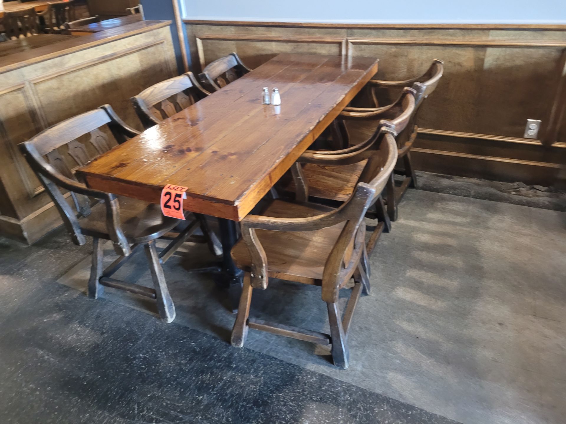 6-Seat varnished hardwood dining table and (6) pub-style wooden chairs