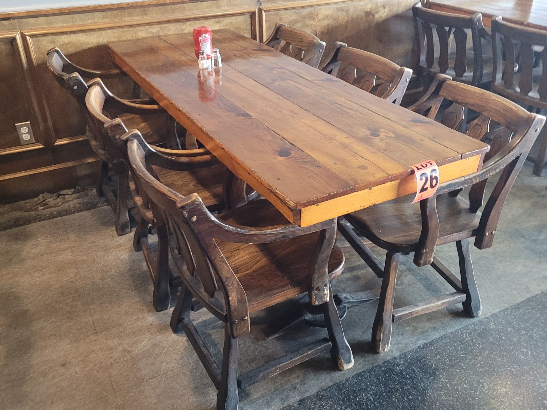 6-Seat varnished hardwood dining table and (6) pub-style wooden chairs