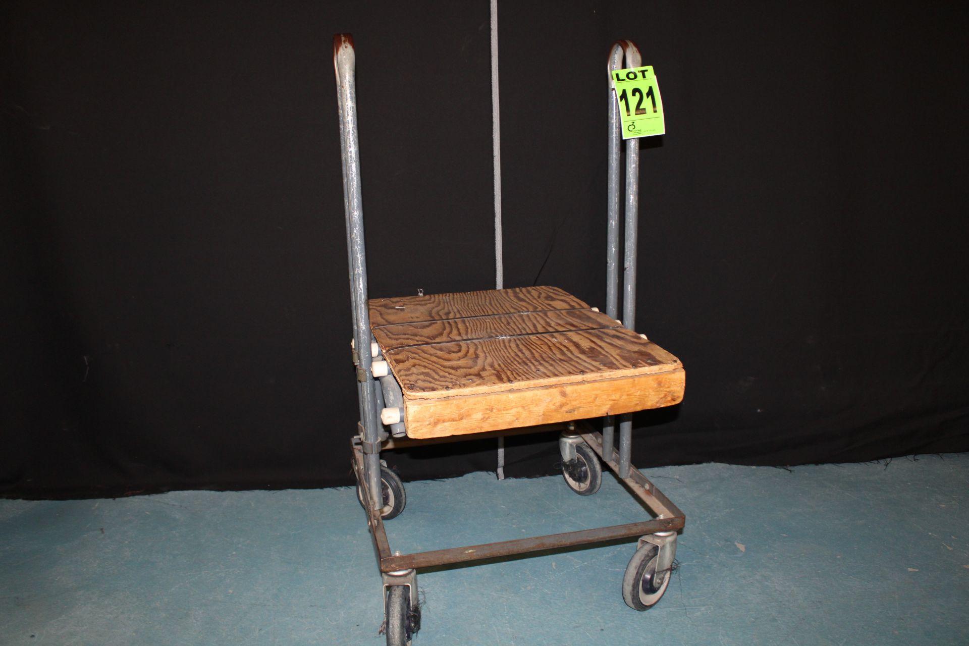 Lot of (4) steel frame loader carts with casters and wooden shelf