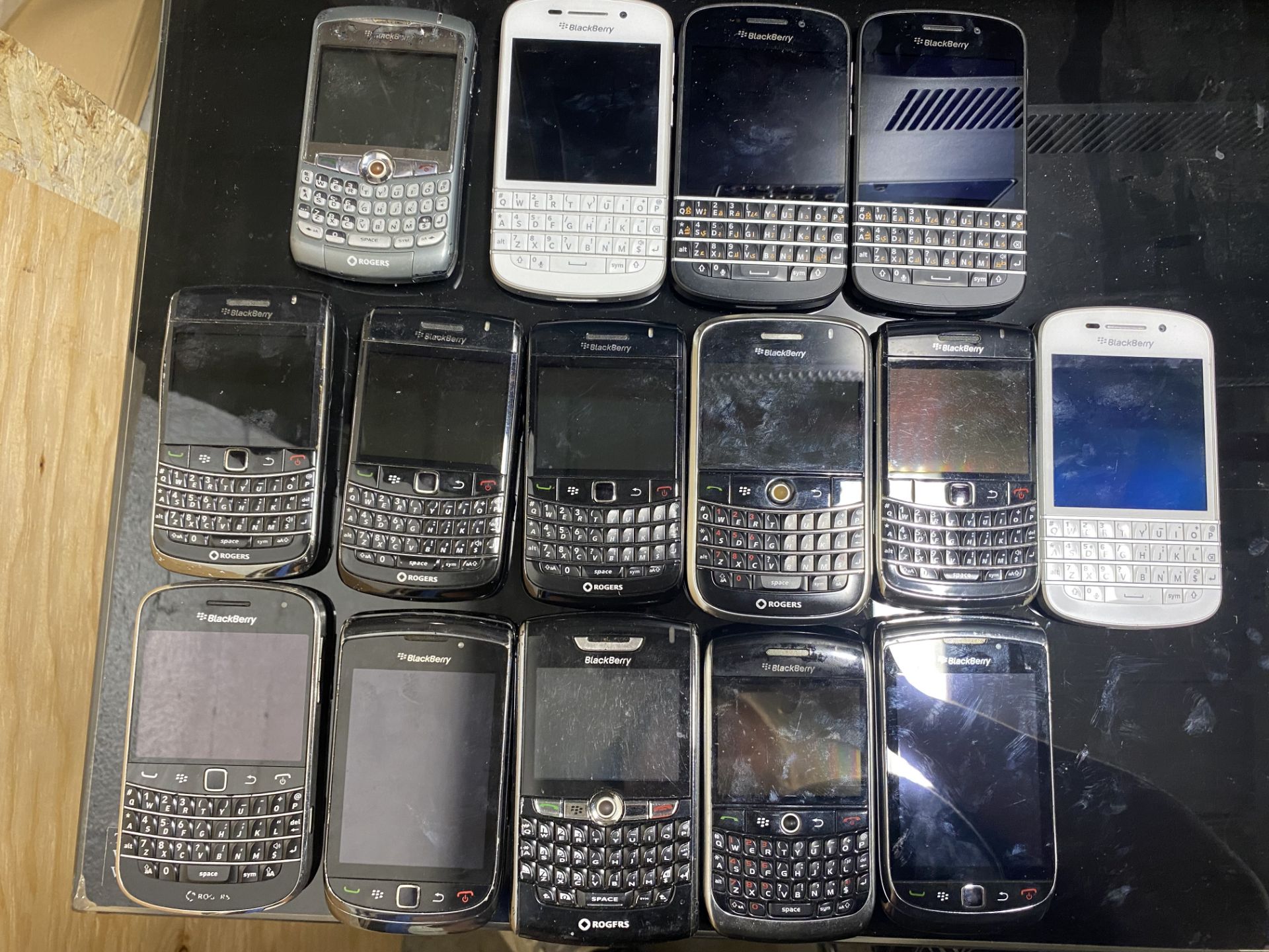 Lot of (14) Blackberry Telephones (No Batteries Included)