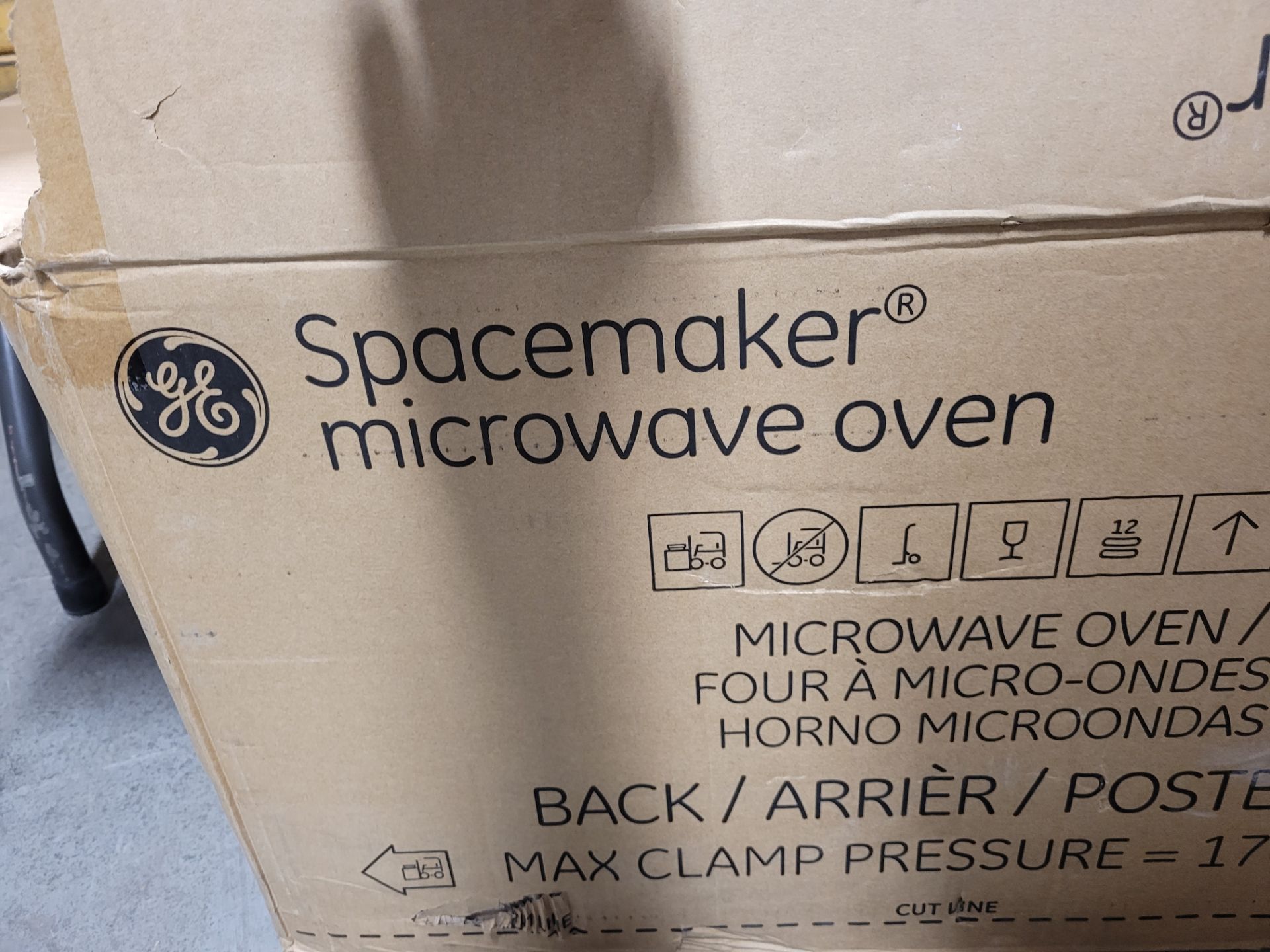 GE mod. Spacemaker microwave oven, with box, 13" x 24" x 13", 33lbs - Image 2 of 3