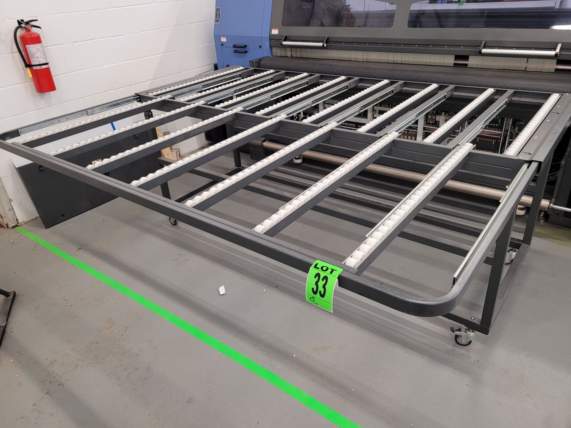 Extendable entry/exit roller conveyor on casters, 92" x 45" x 38" (up to 75")