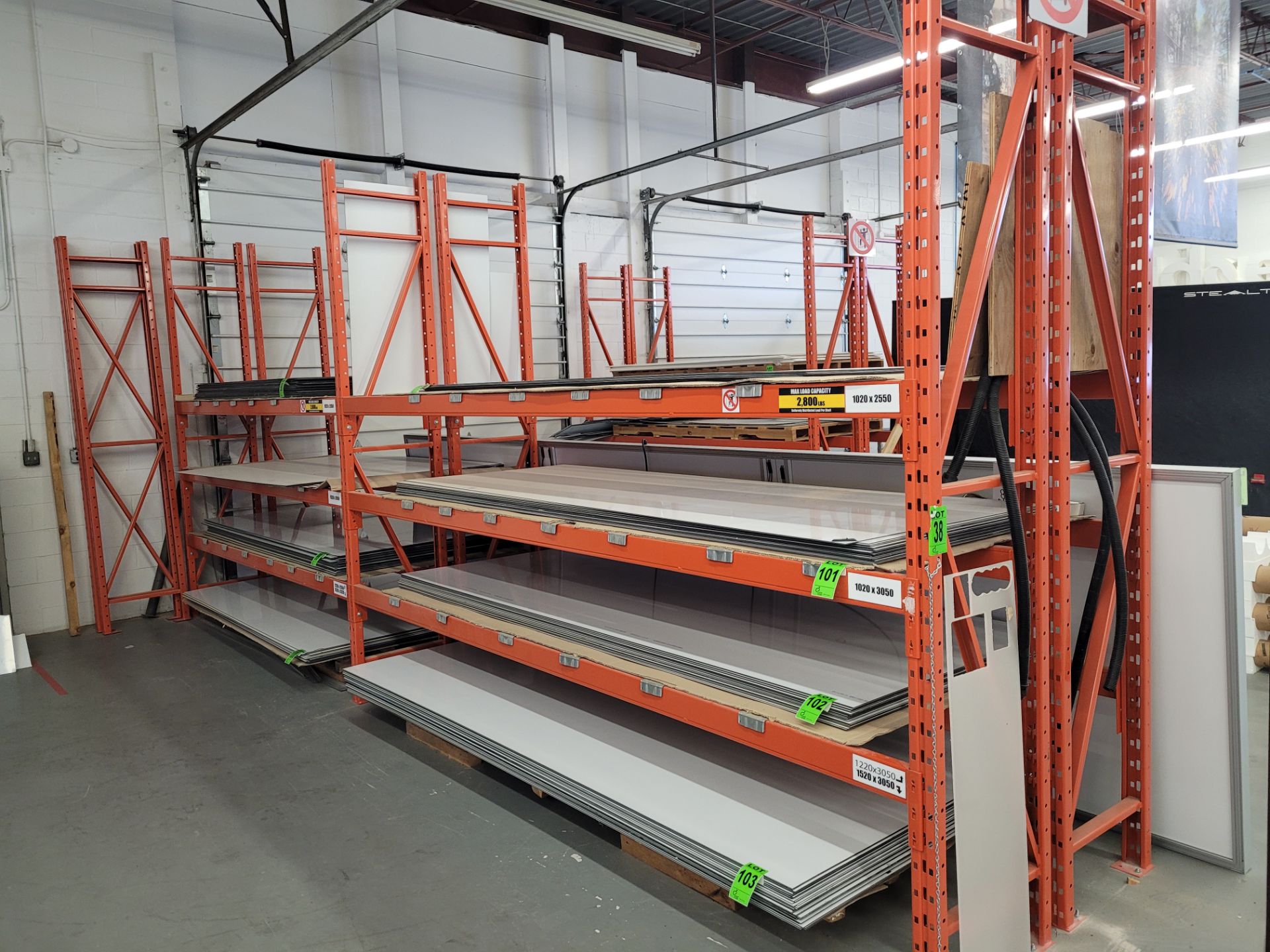 (4) Sections of industrial pallet racking , (8) Uprights 2' W x 10' H, (18) 12' beams (2,800lb cap.)