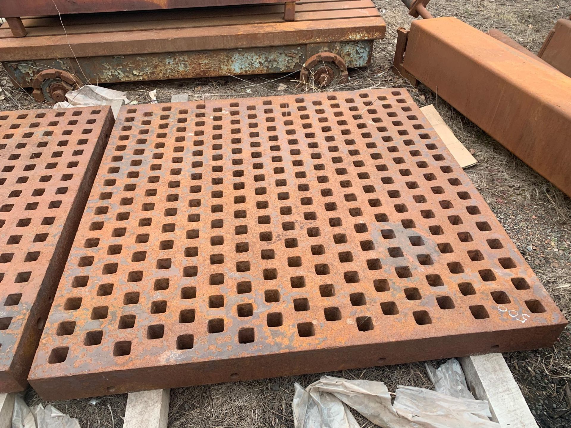 Acorn Style Welding Platen. Approx 61.5" x 61.5" x 5.25" deep with 2" square holes. Note: Small crac