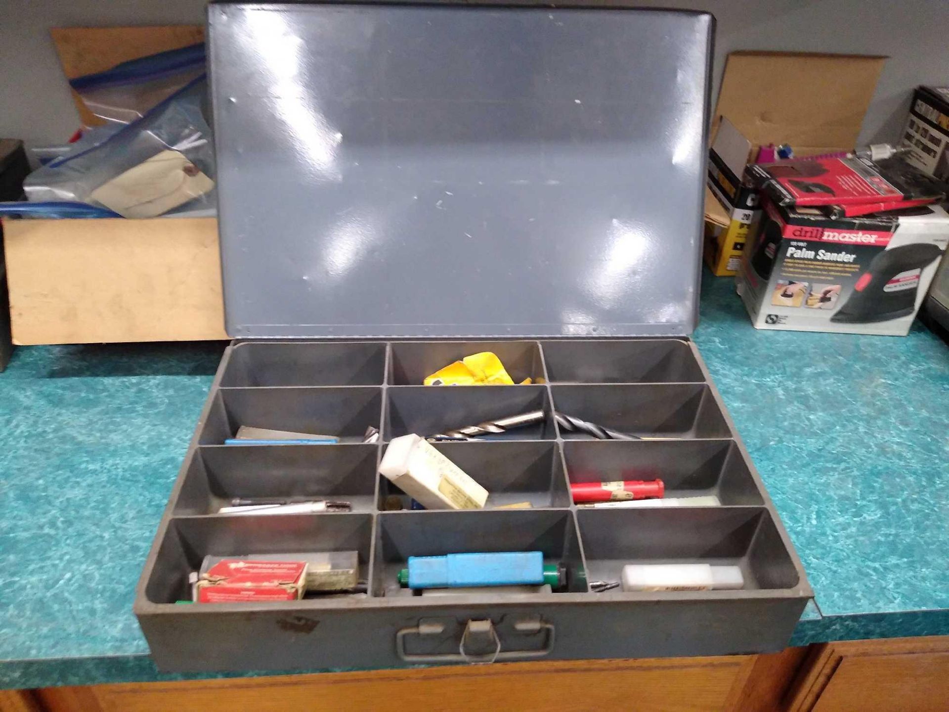 12 Compartment Parts Organizer with Contents. Includes Square Shank Cutting Tools, End Mills, and Dr