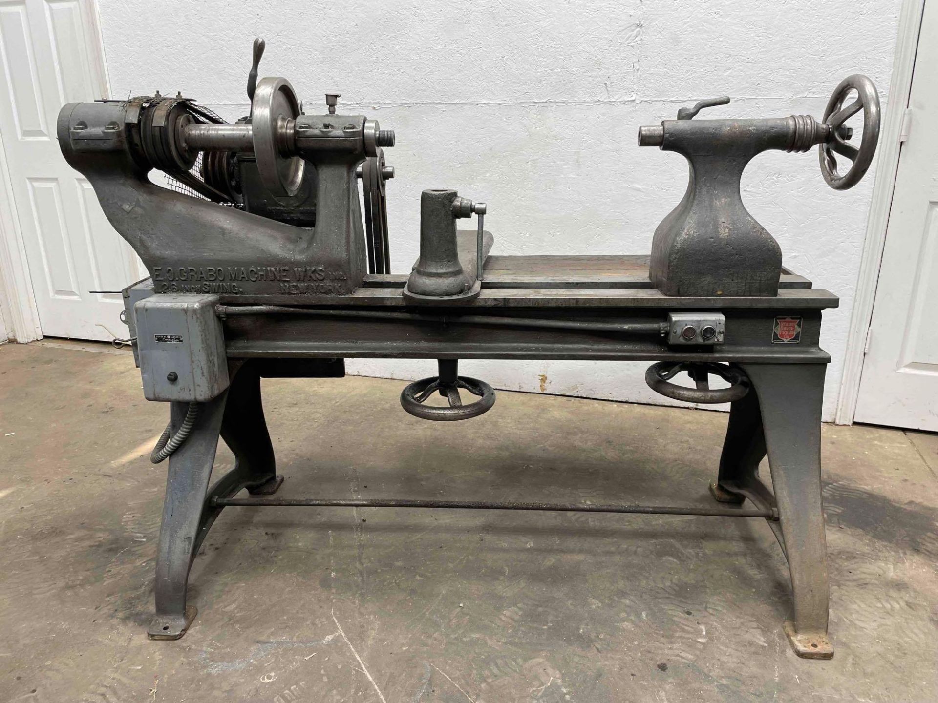 E.O.Grabo Machine Wks Spinning Lathe, 26 in Swing, 24 in Between Centers, 3 HP, 1 Phase, 208V $50 Ba