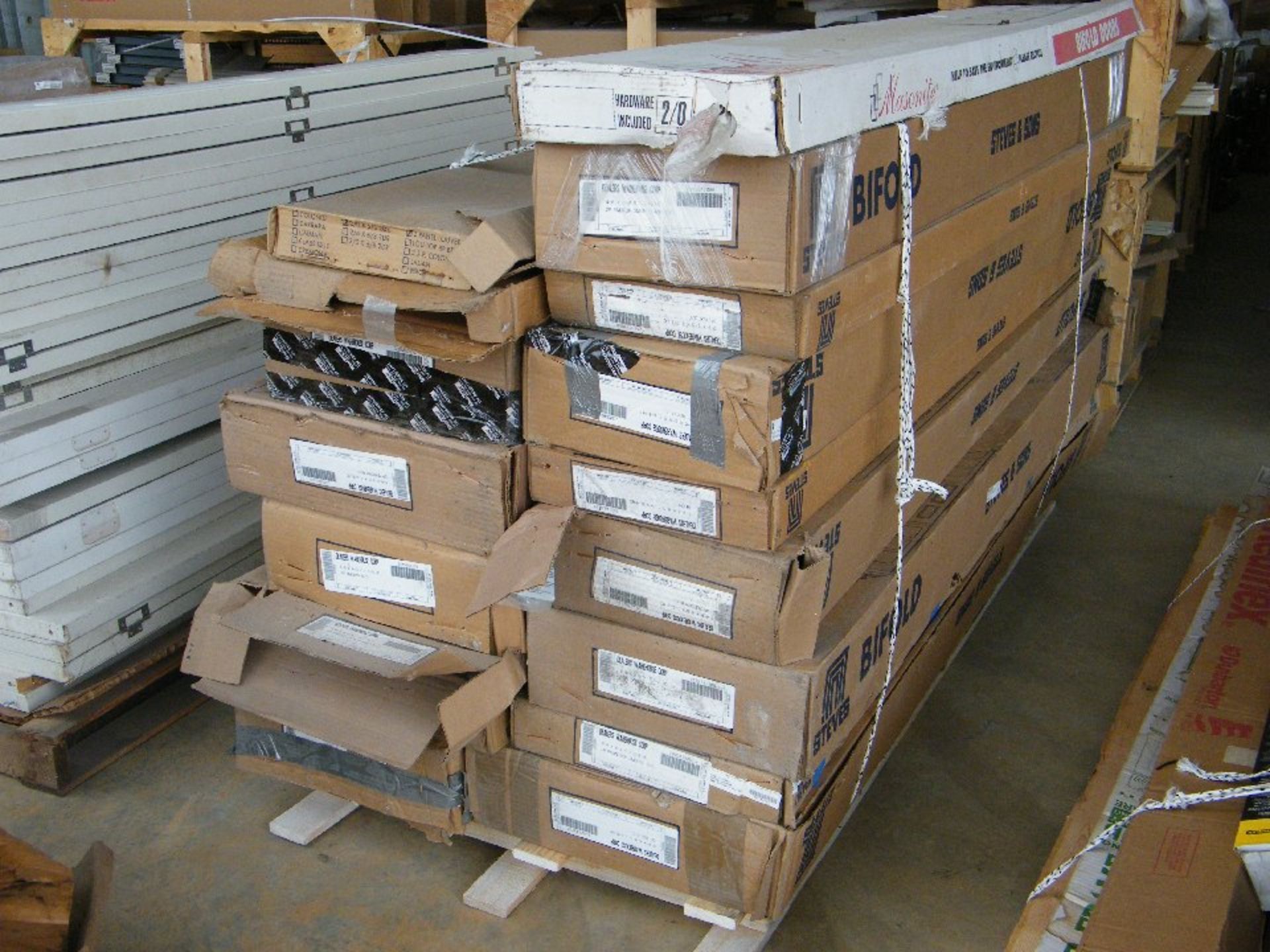 17 Assortment of Boxed Bi-fold doors. LOCATION: 7580 Thunder Ln, Powell, TN 37849