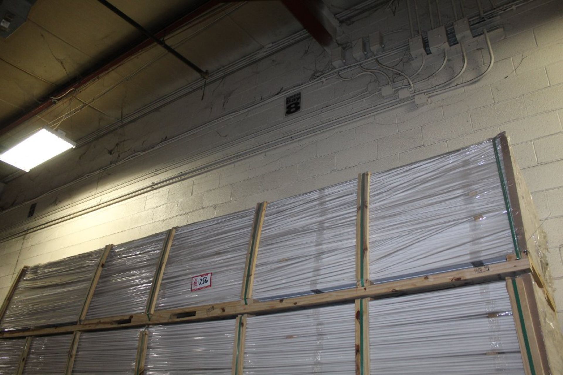 Pallet of 4 - 5/8 x 16 crown molding. LOCATION: 7580 Thunder Ln, Powell, TN 37849