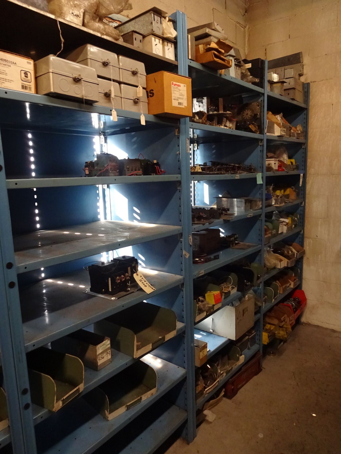 LOT: Assorted Elevator Parts in (3) Sections of Shelving (no shelving), plus (1) Stand-Alone Section