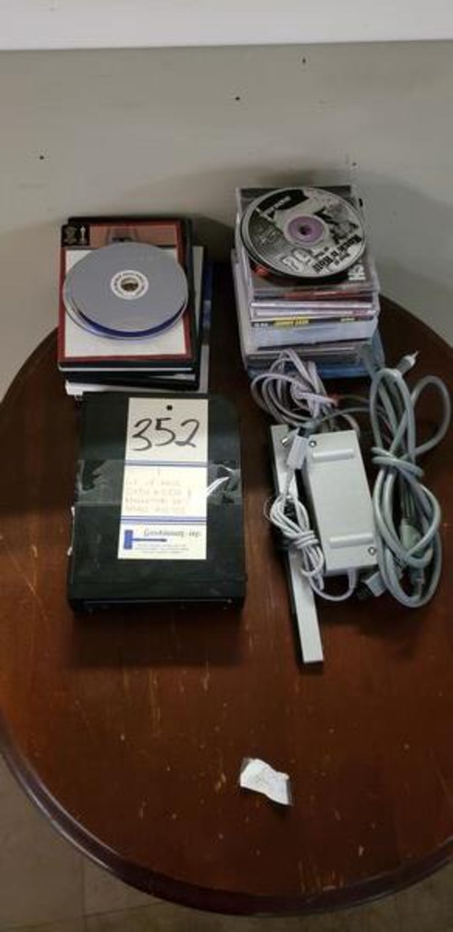 LOT OF MISCELLANEOUS DVDS AND CDS, WITH A NINTENDO Wii MODEL RVL-101