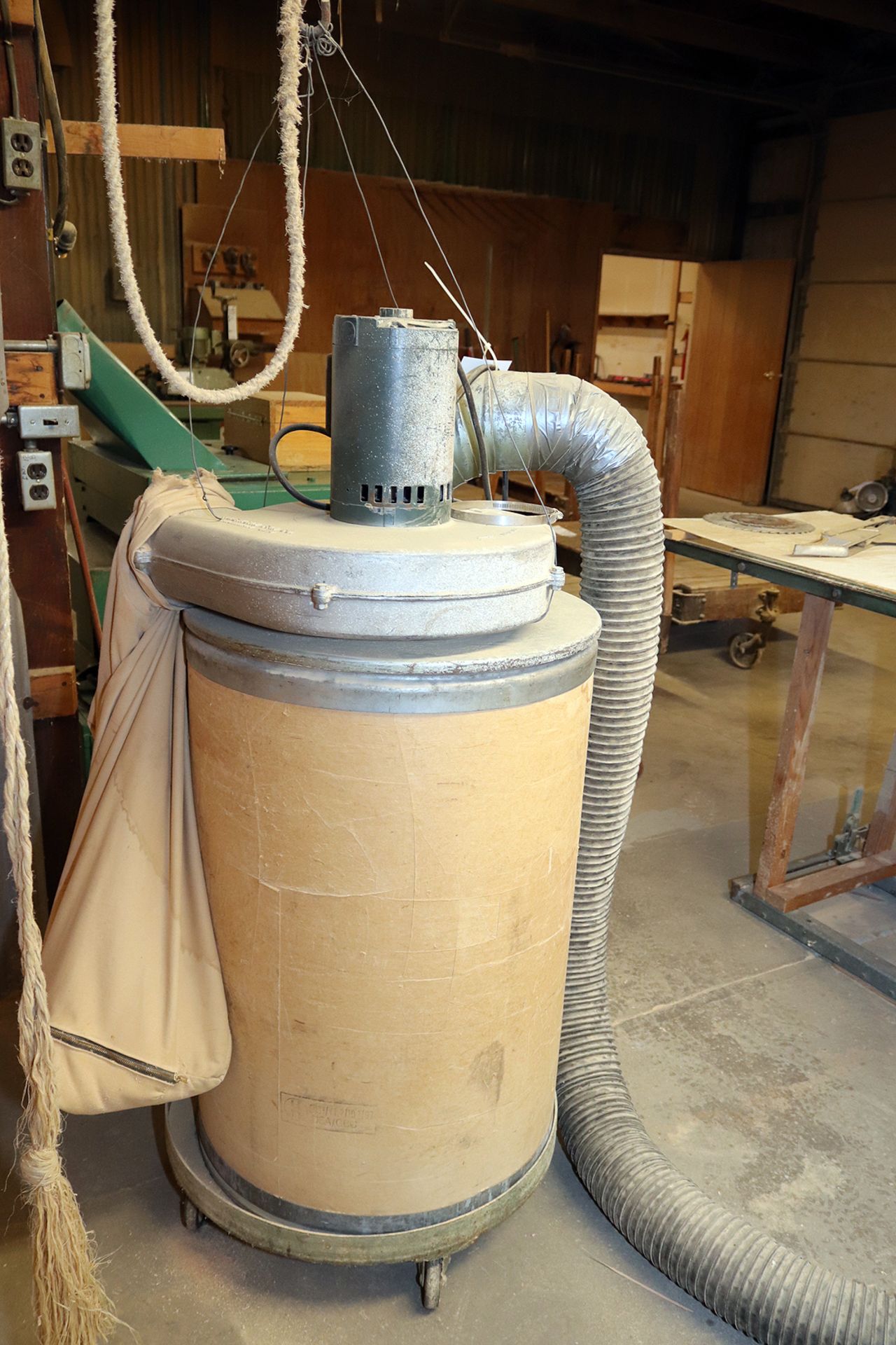 Older American Fan Company single barrel dust collector