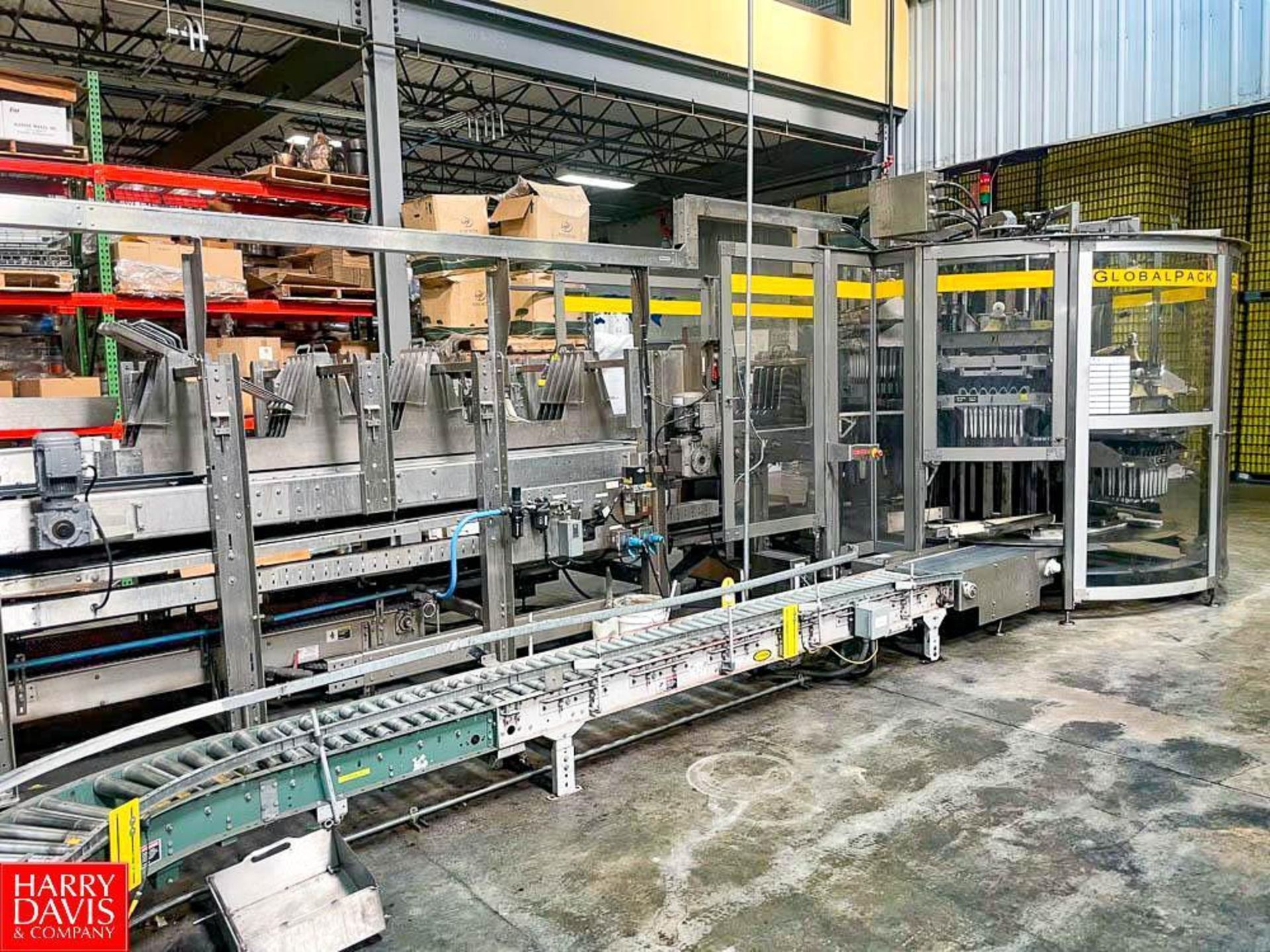Hytrol Full Case Power Roller Conveyor Exit Conveyor from Hartness Global Pack to ABC Case Sealer Lo