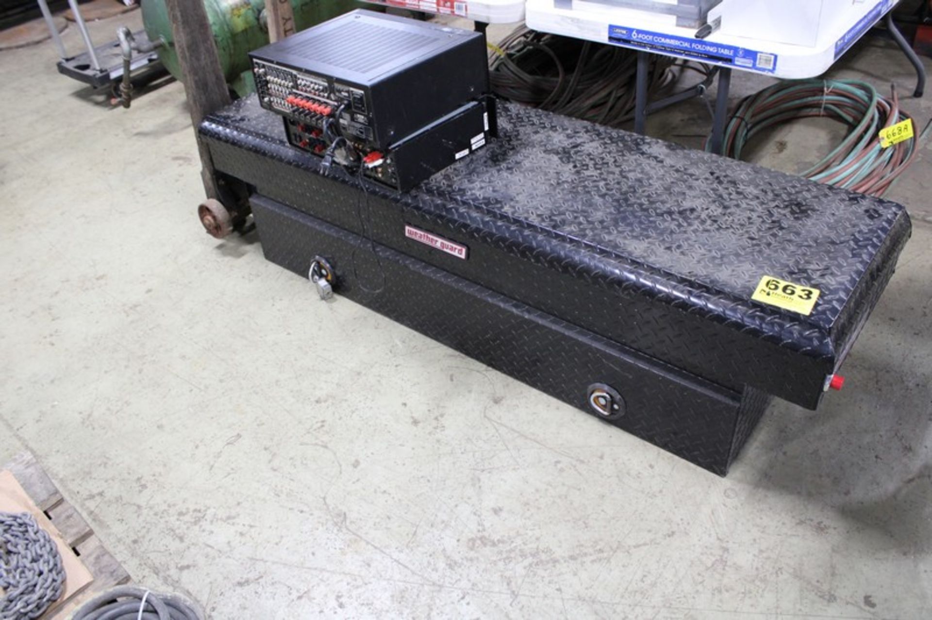 WEATHERGUARD BLACK DIAMOND PLATE TOOL BOX APPROX. 70" X 20"