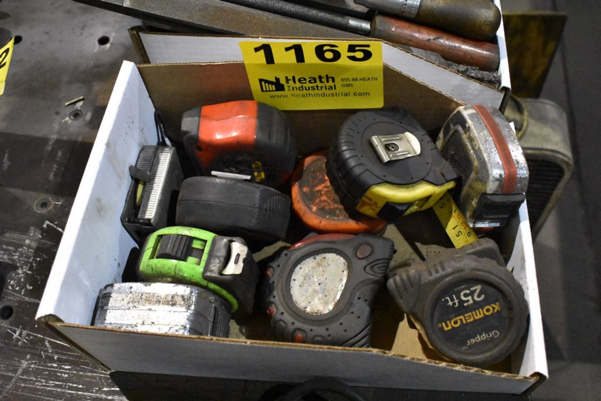 LARGE QTY OF TAPE MEASURES IN BOX