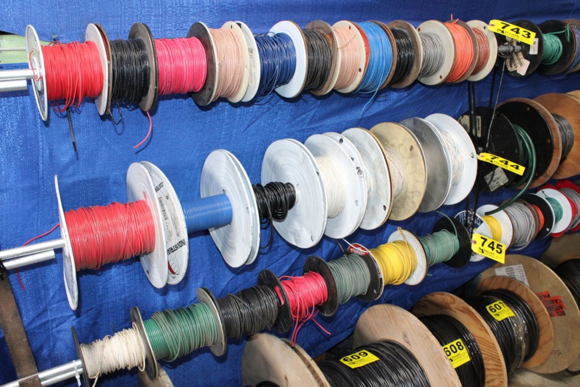 ASSORTED WIRE SPOOLS ON BAR