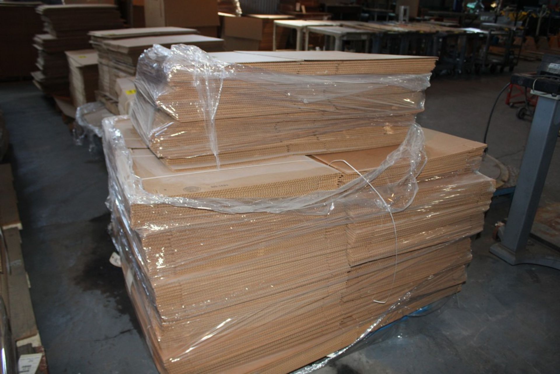 LARGE QTY OF CARDBOARD ON SKID