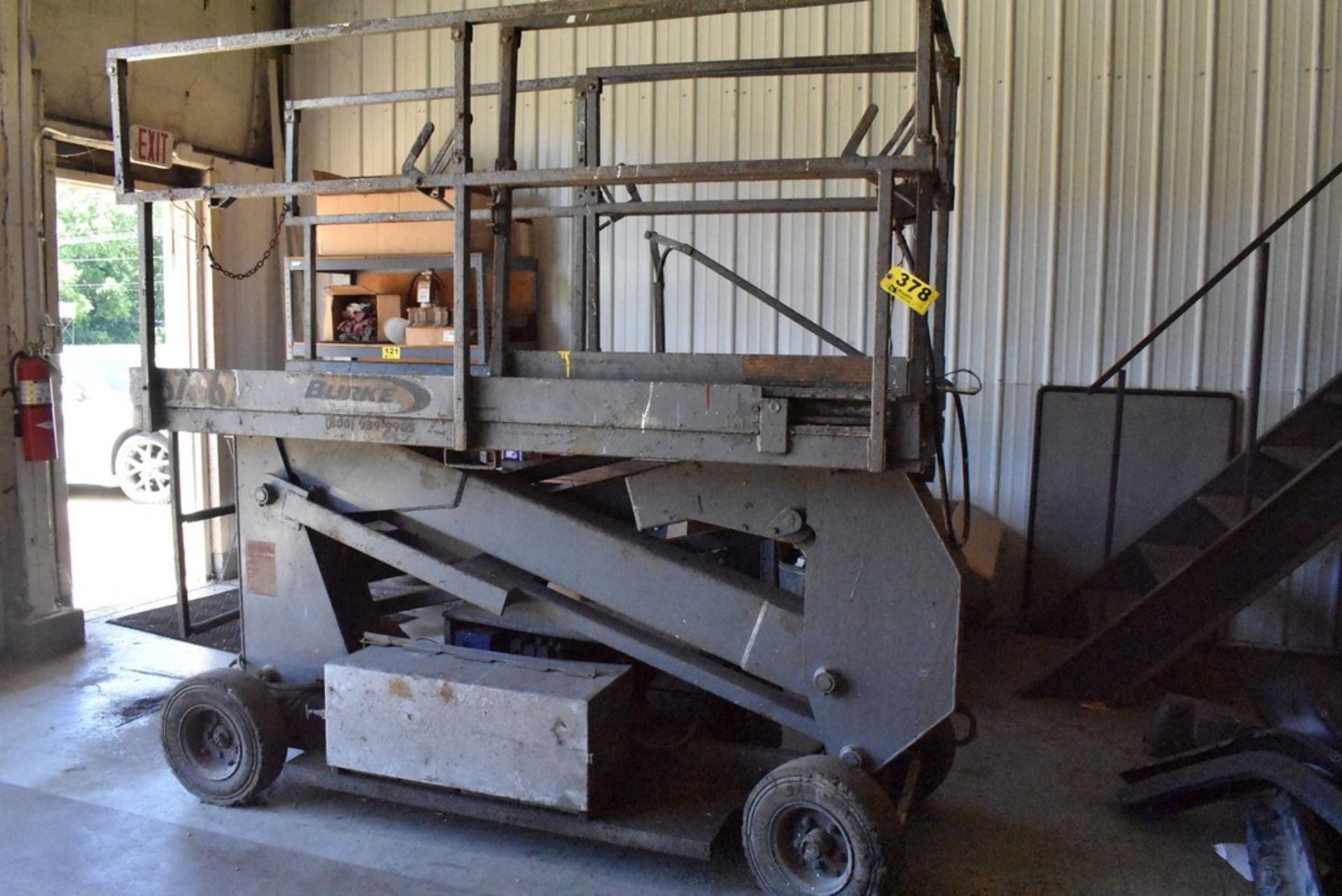 BURKE ELECTRIC SCISSOR LIFT, NEEDS BATTERIES