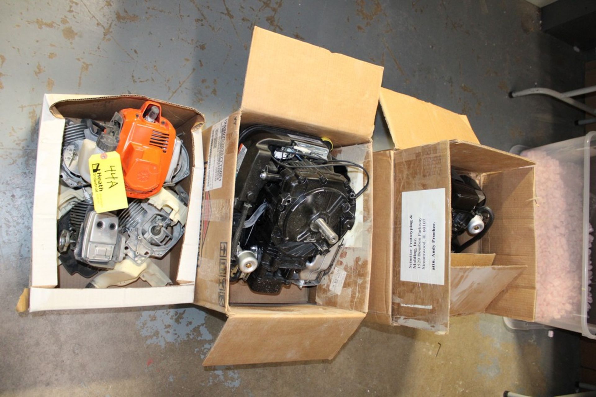 (3) BOXES OF SMALL ENGINE PARTS, (2) LAWN MOWER MOTORS, ETC.