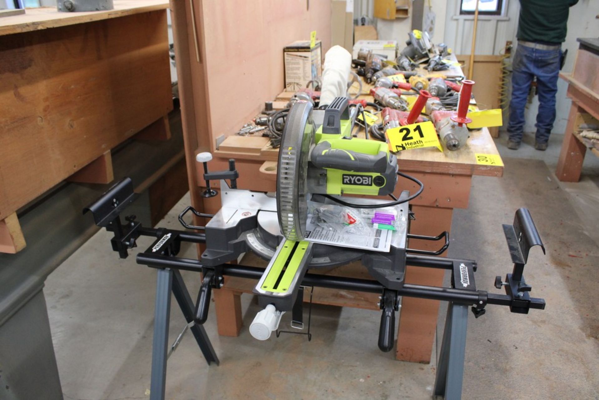 RYOBI MODEL TSS103 10" SLIDING COMPOUND MITRE SAW WITH PERFORMAX PORTABLE STAND