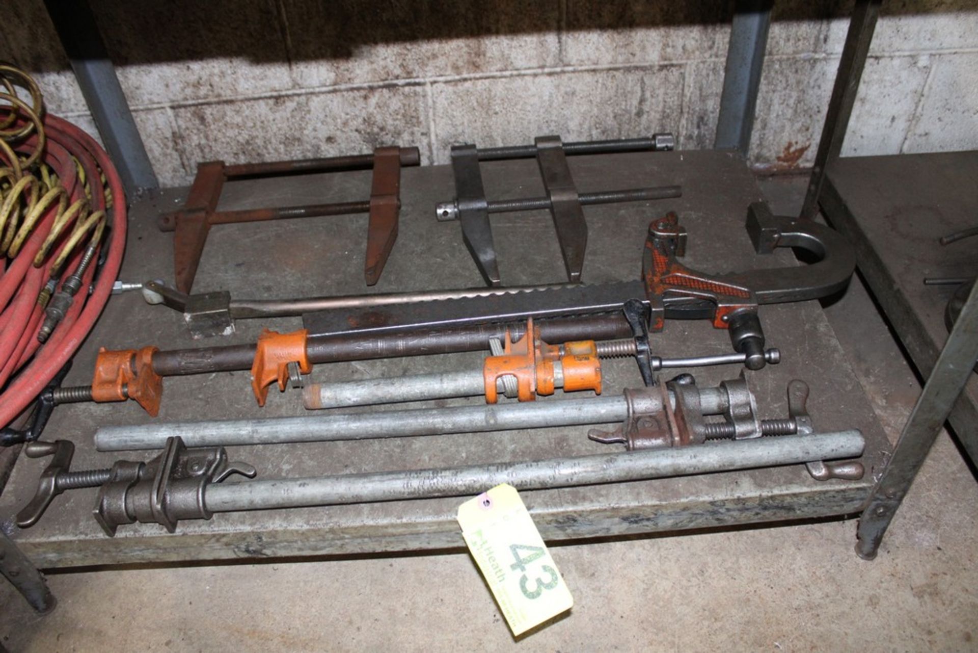 ASSORTED BAR CLAMPS UNDER BENCH