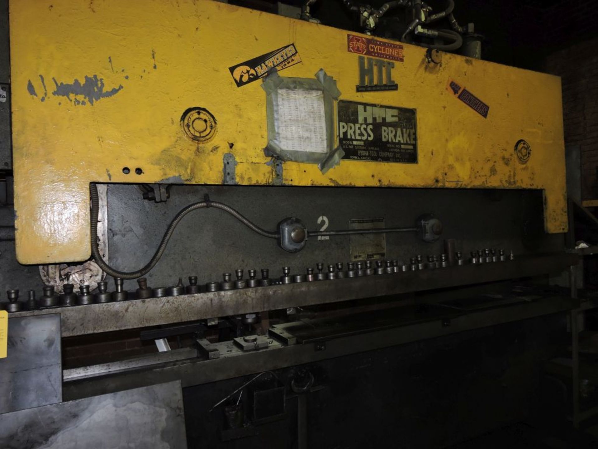 HTC hydraulic punch press, model 830GS, 130 T., 9' 7", 150 punches.