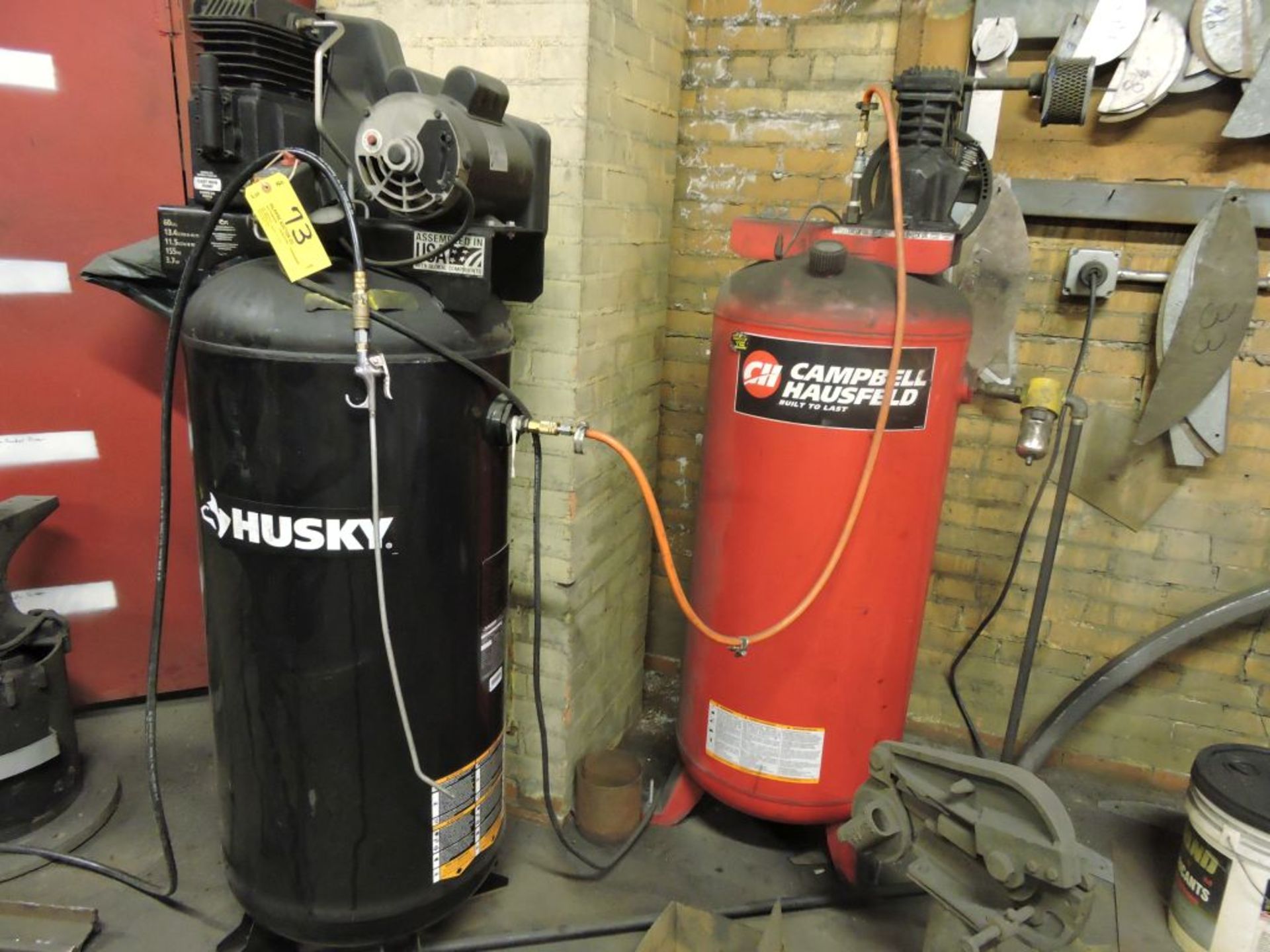Husky and Campbell Hausfeld air compressors.