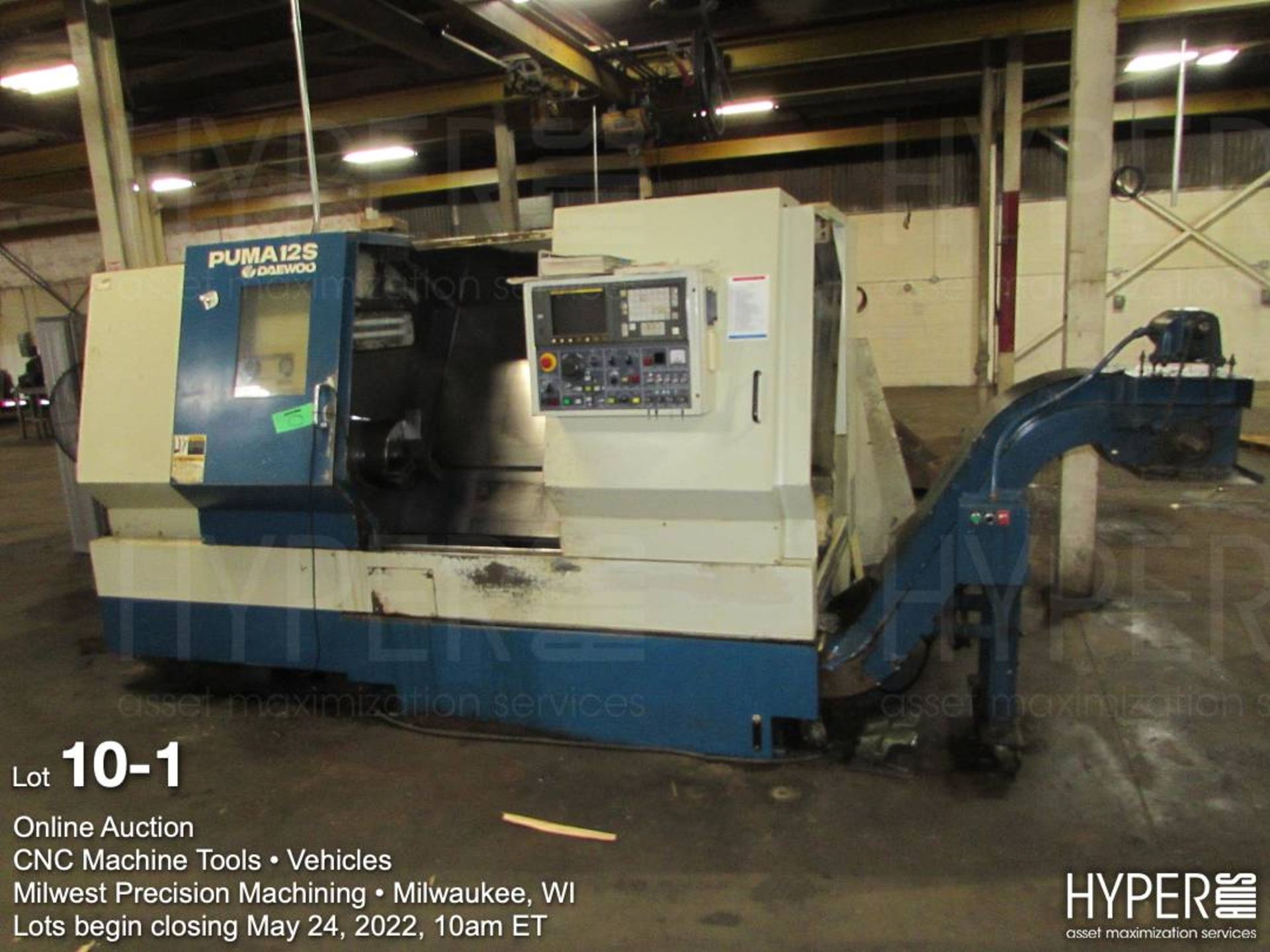 Daewoo Puma 12-S CNC lathe S/N PS100877, 12 position tool turret, three jaw 12" diameter chuck with