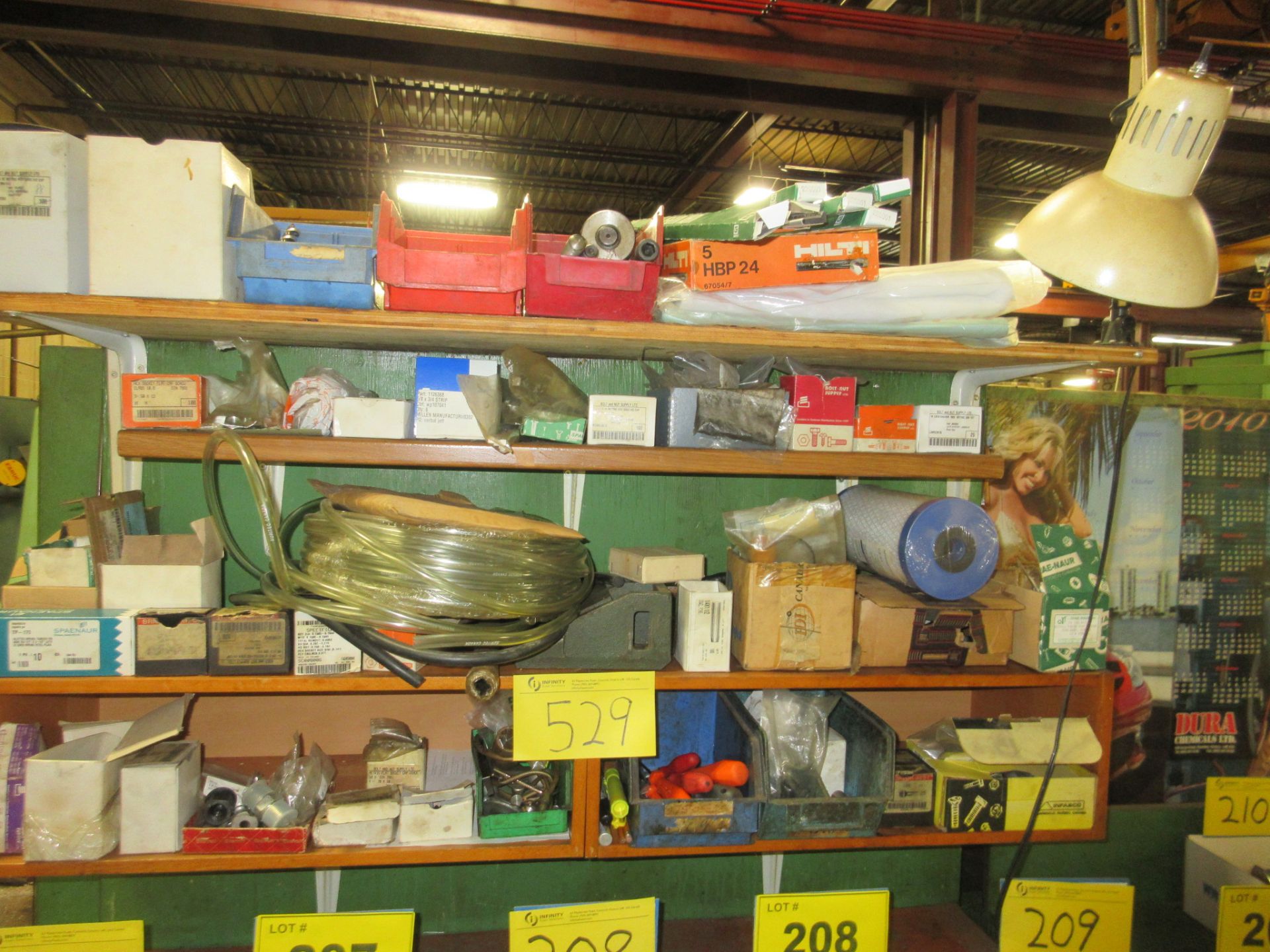 CONTENTS OF 4-LEVEL WOOD SHELVING UNIT, FASTENERS, FILTERS, PARTS, ETC.