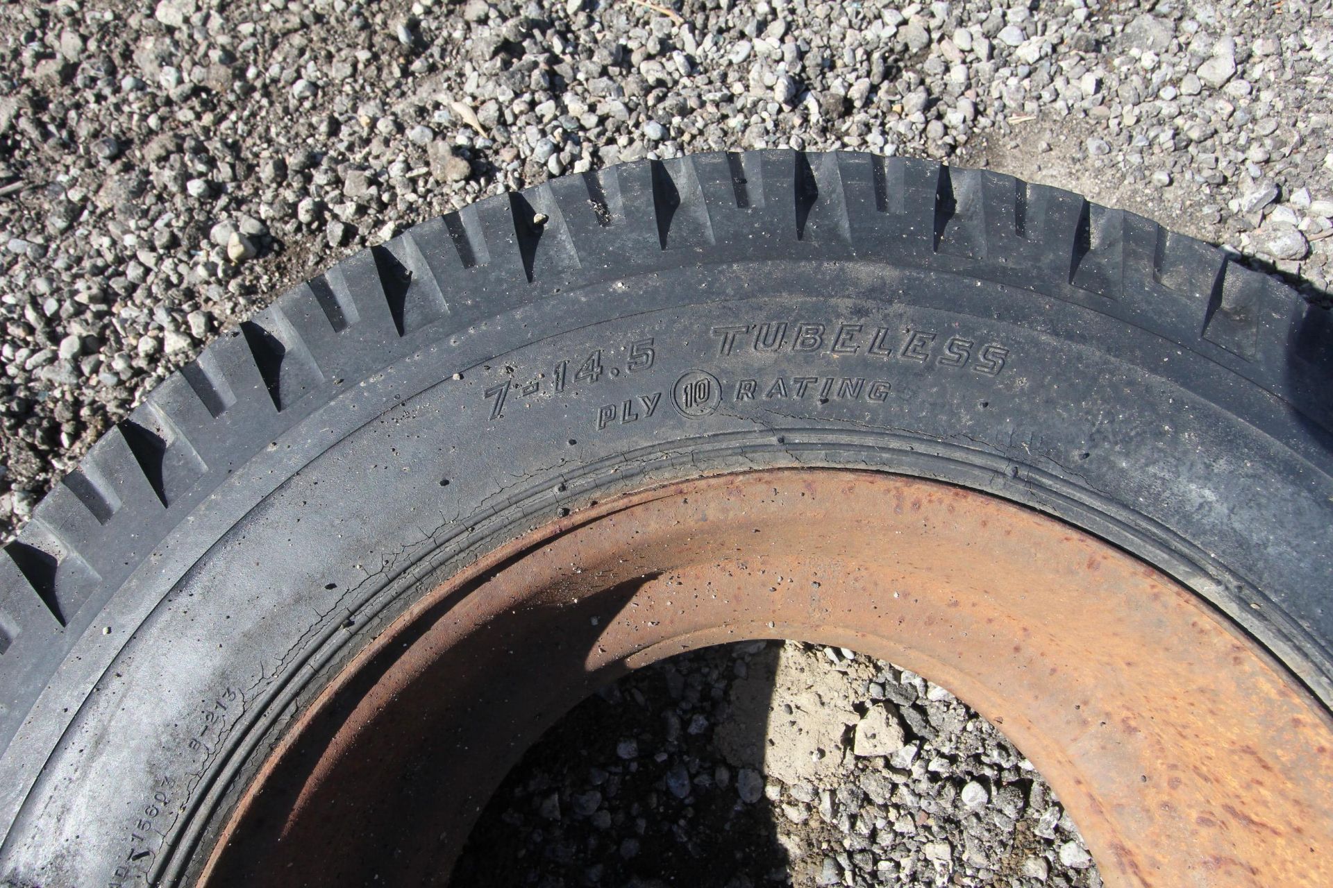 SET OF (4) 7-14.5 TUBLESS TIRES ON RIMS - Image 2 of 2