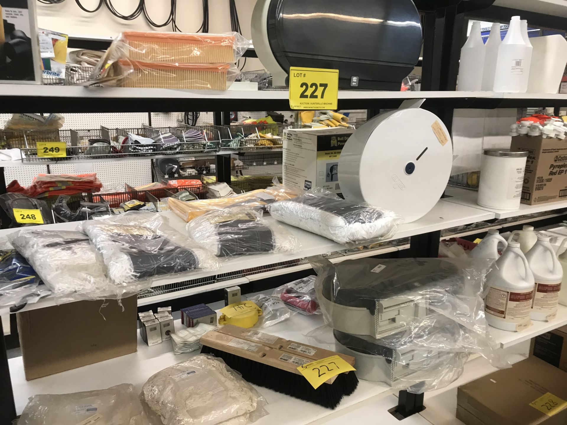 CONTENTS OF (3) SHELVES OF (1) SECTION OF DISPLAY RACK INCLUDING MOP, BROOM ATTACHMENTS, TOILET