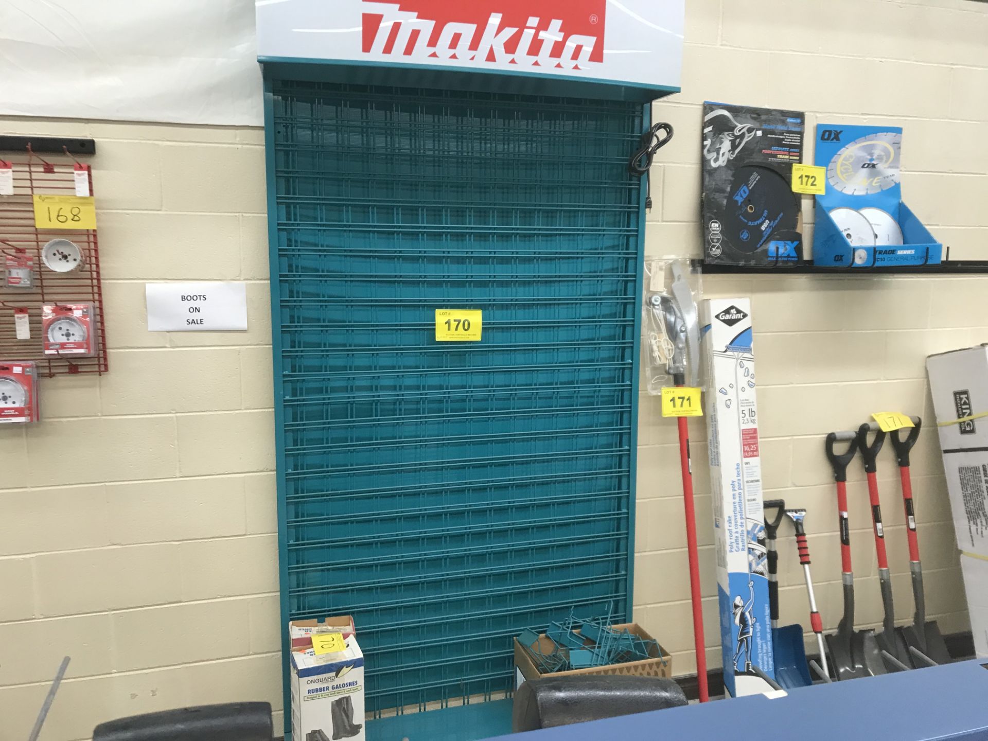 MAKITA CAGED WALL DISPLAY W/ (2) PAIRS OF RUBBER GALOSHER