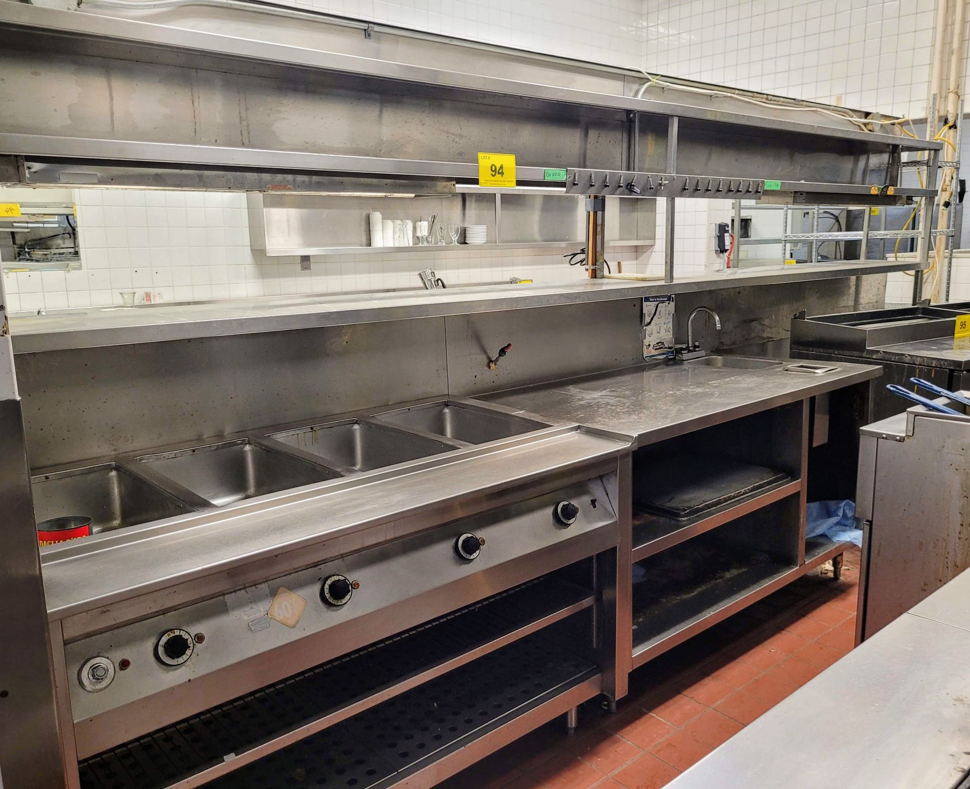 HERCULES STAINLESS STEEL PREP AND SERVICE STATION W/ SINK, MERCO HEAT LAMPS, CUTLERY AND TRAY