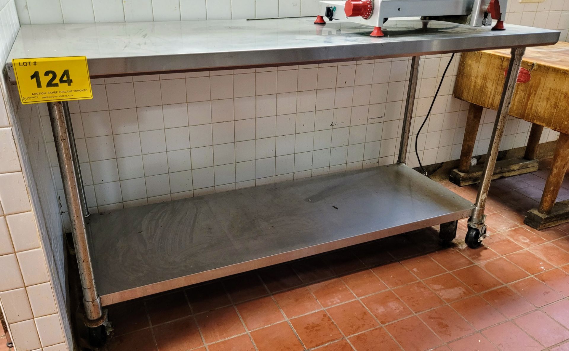 STAINLESS STEEL PREP TABLE ON CASTORS - (72"L X 30"W X 40'H)