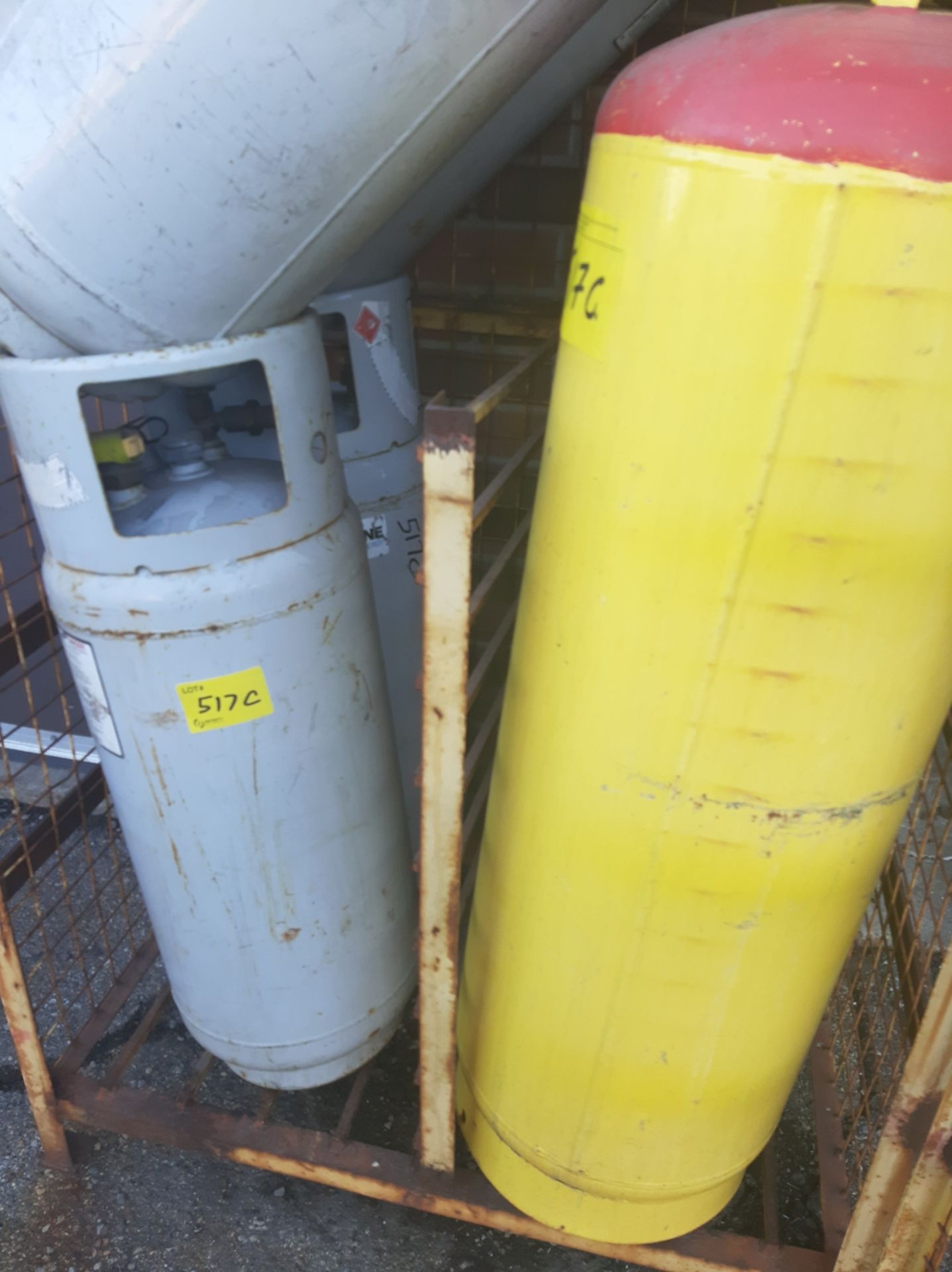 LOT OF (3) STEEL PROPANE CYLINDERS, (1) ALUMINUM PROPANE CYLINDERS, (1) YELLOW PROPANE CYLINDER