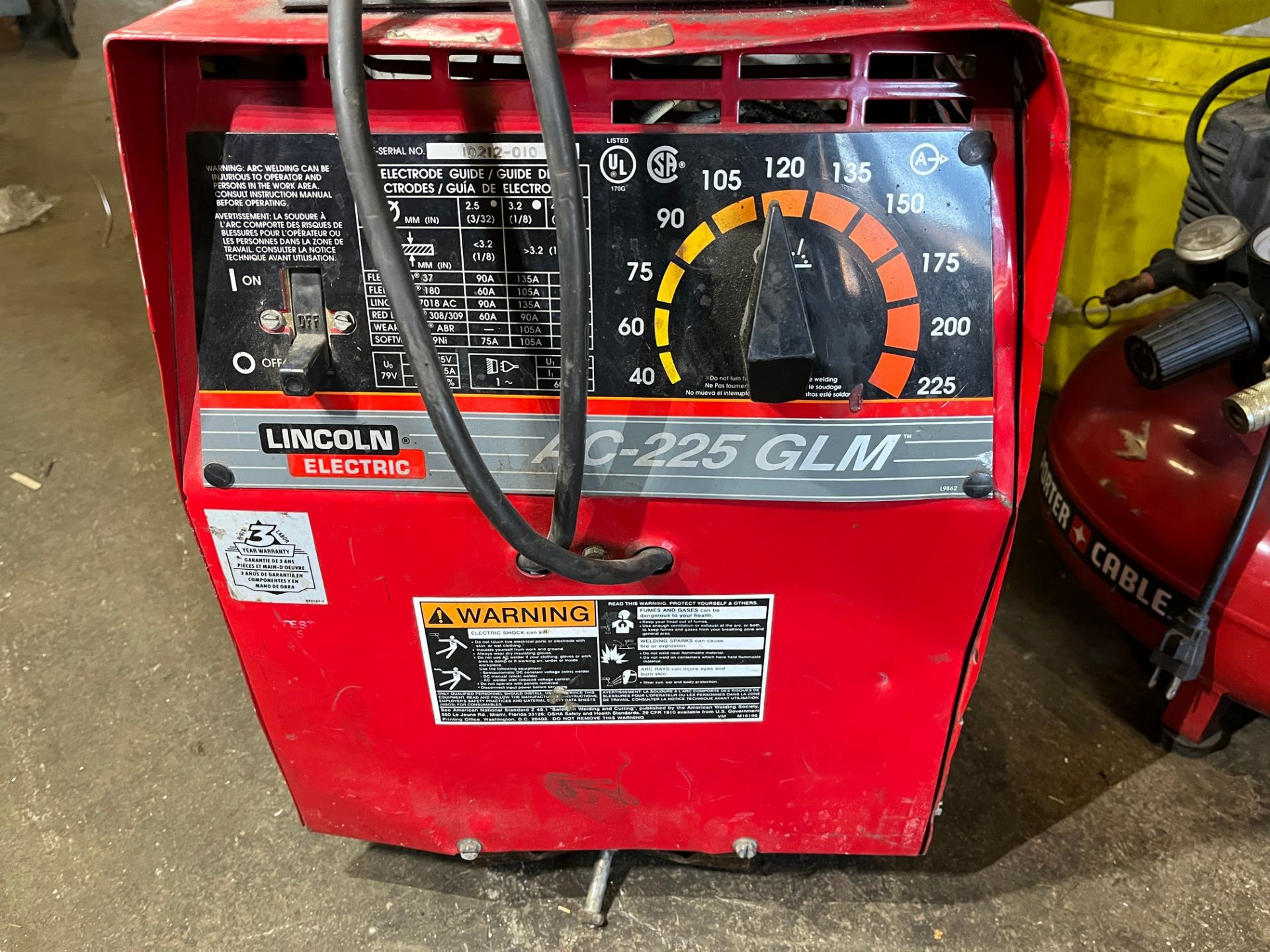 LINCOLN ELECTRIC AC-225 GIM WELDER W/ CABLES AND HELMET - Image 2 of 2