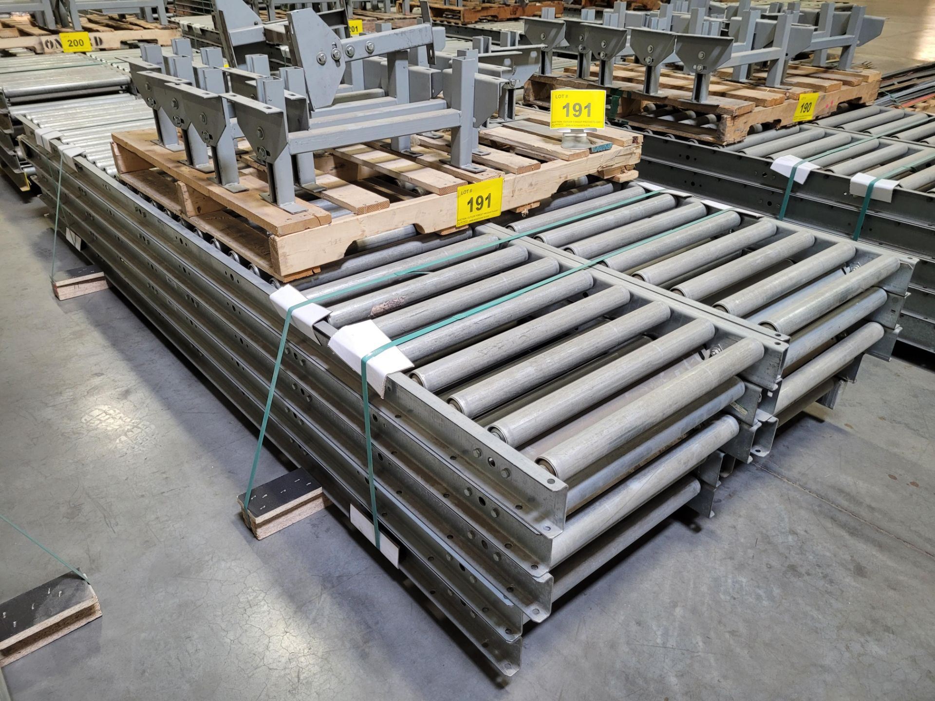 LOT - (10) 120"L X 24"W ROLLER TOP CONVEYORS W/ (10) STANDS