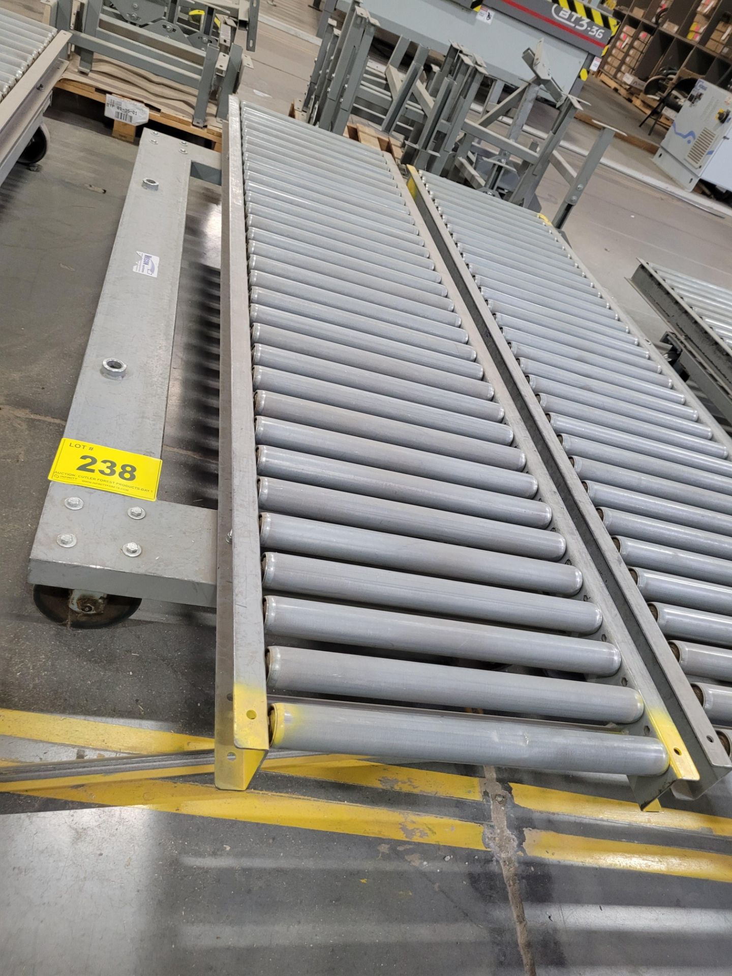 96"L X 24"W ROLLING CONVEYOR W/ LARGE METAL DOLLY