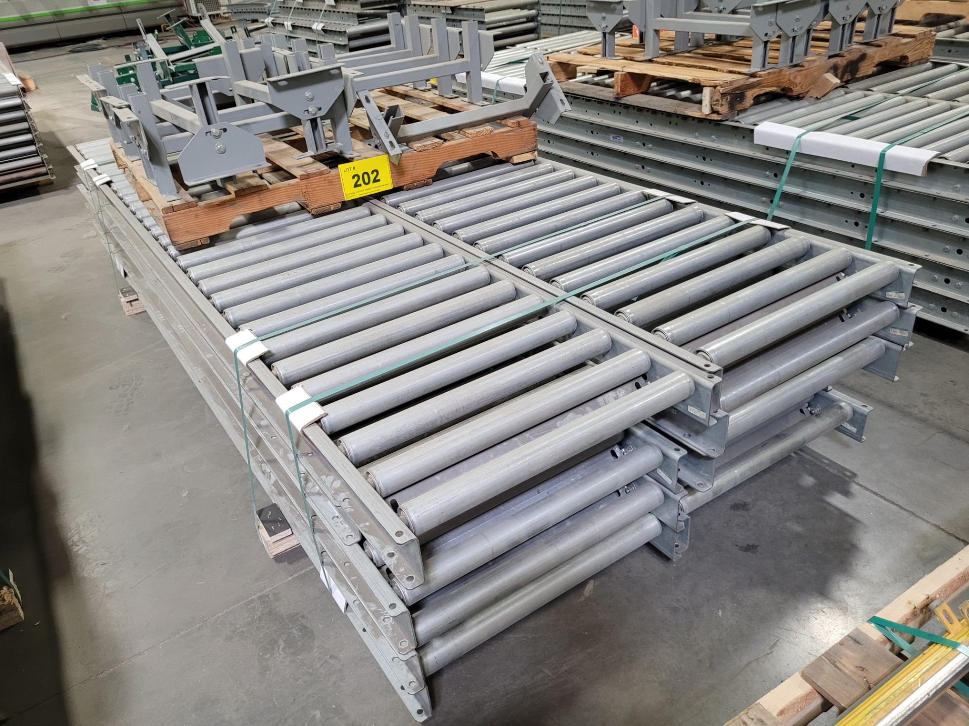 LOT - (10) 120"L X 24"W ROLLER TOP CONVEYORS W/ (10) STANDS