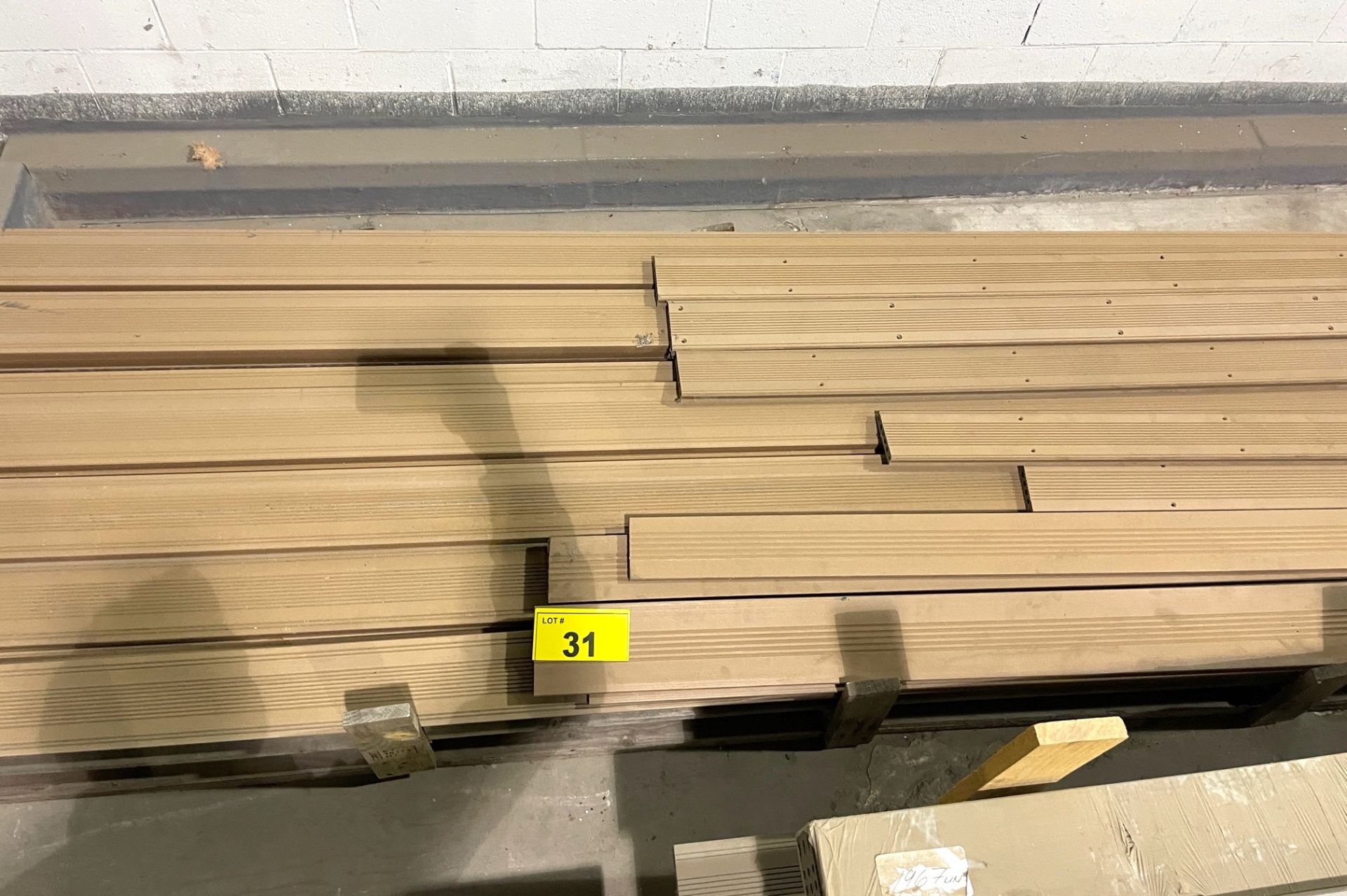 LOT - APPROX (48) PVC PLANKS 1" THICK - BROWN ASSORTED LENGTHS (RIGGING FEE $50)