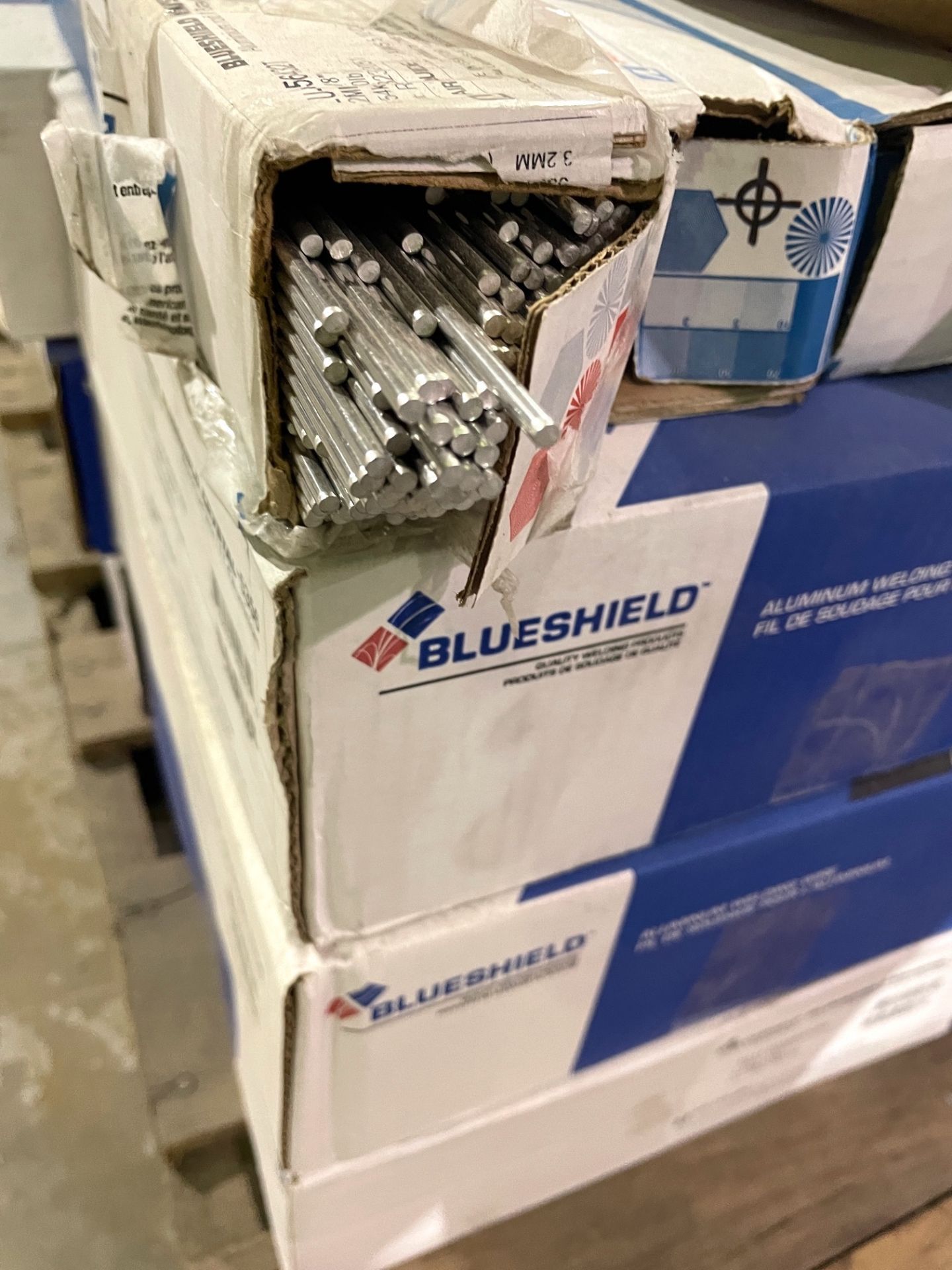 LOT - BLUESHIELD WELDING WIRE AND RODS (RIGGING FEE $25) - Image 2 of 5