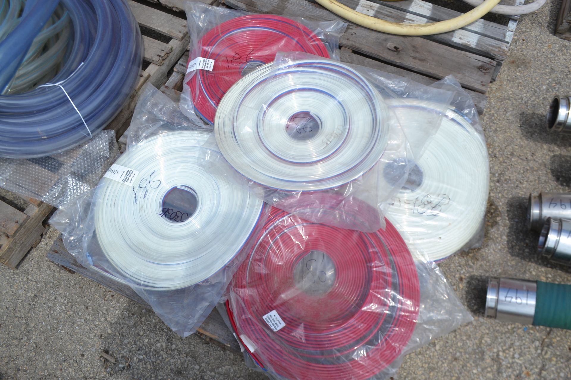 1 Lot of 5 Packages of Unused 1/4" Air Hose Each Packaged 150' of Hose.