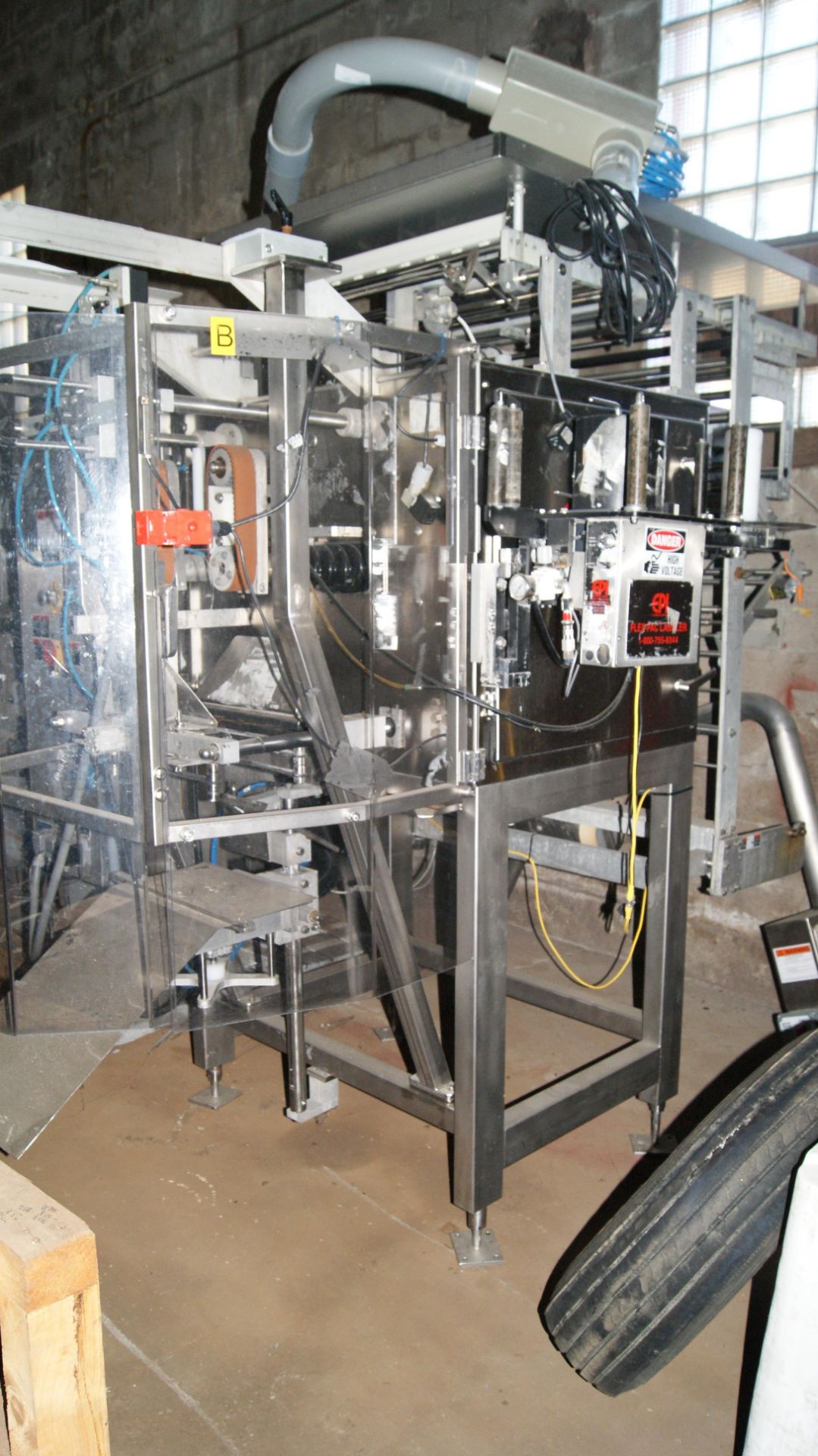 Complete Vertical Form Fill and Seal System; includes Vision Packaging Company Sanitary Vertical