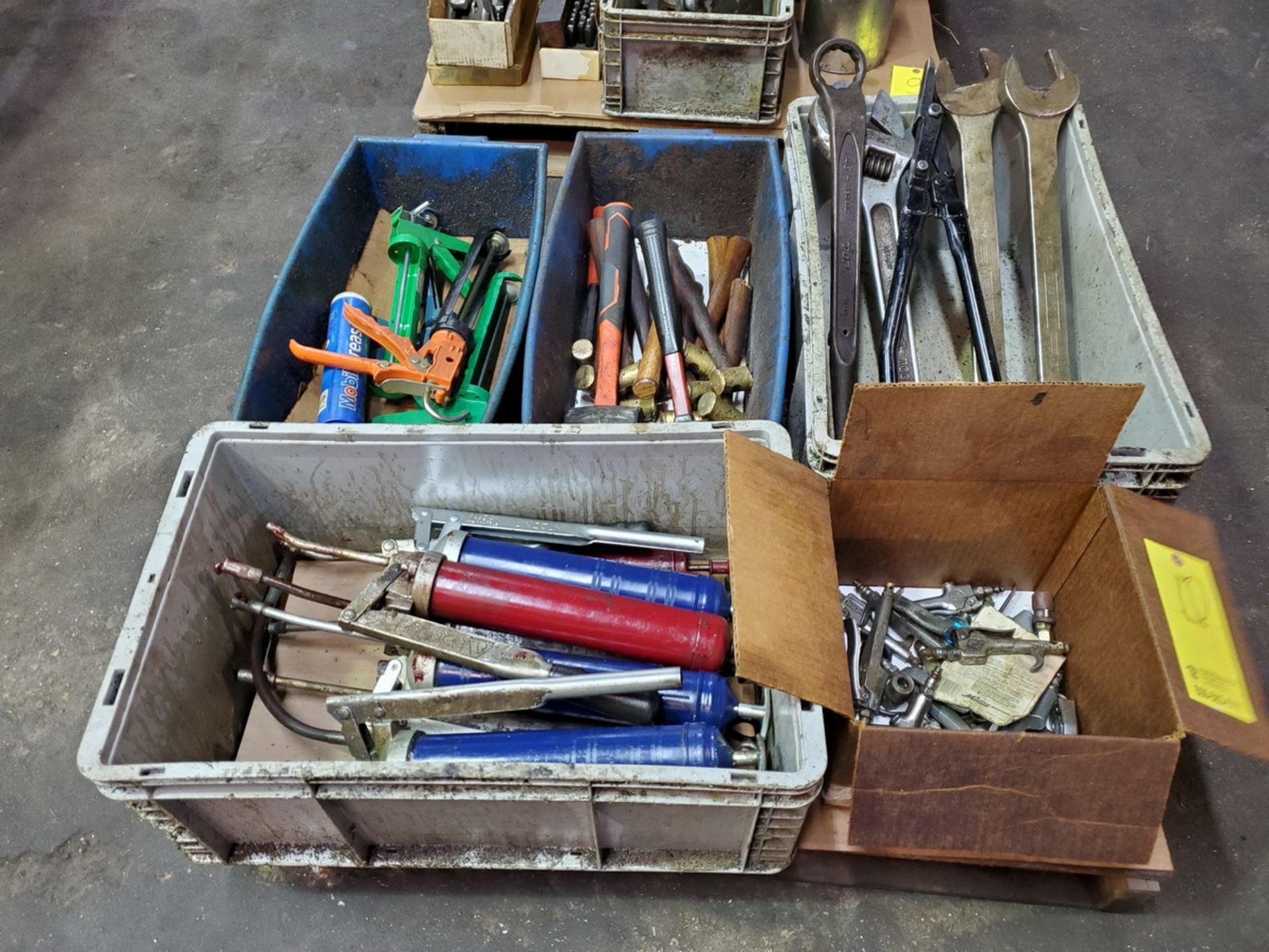 Assorted Material To Include But Not Limited To: Assorted Wrenches & Hammers, Grease Guns, Air Hose