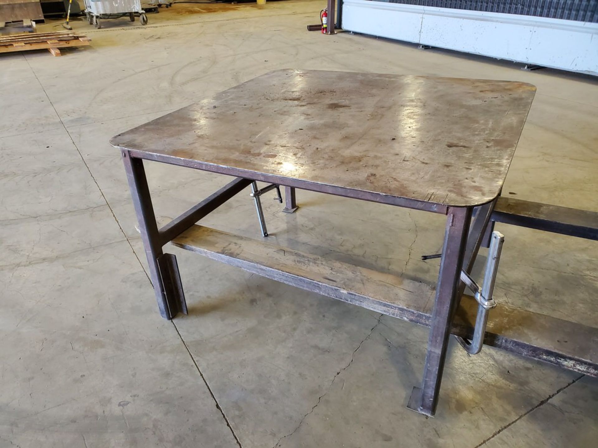 (3) Stl Tables (2) 48" x 48" x 30"H; (1) 48" X 48" X 38"H (Clamps Excluded)