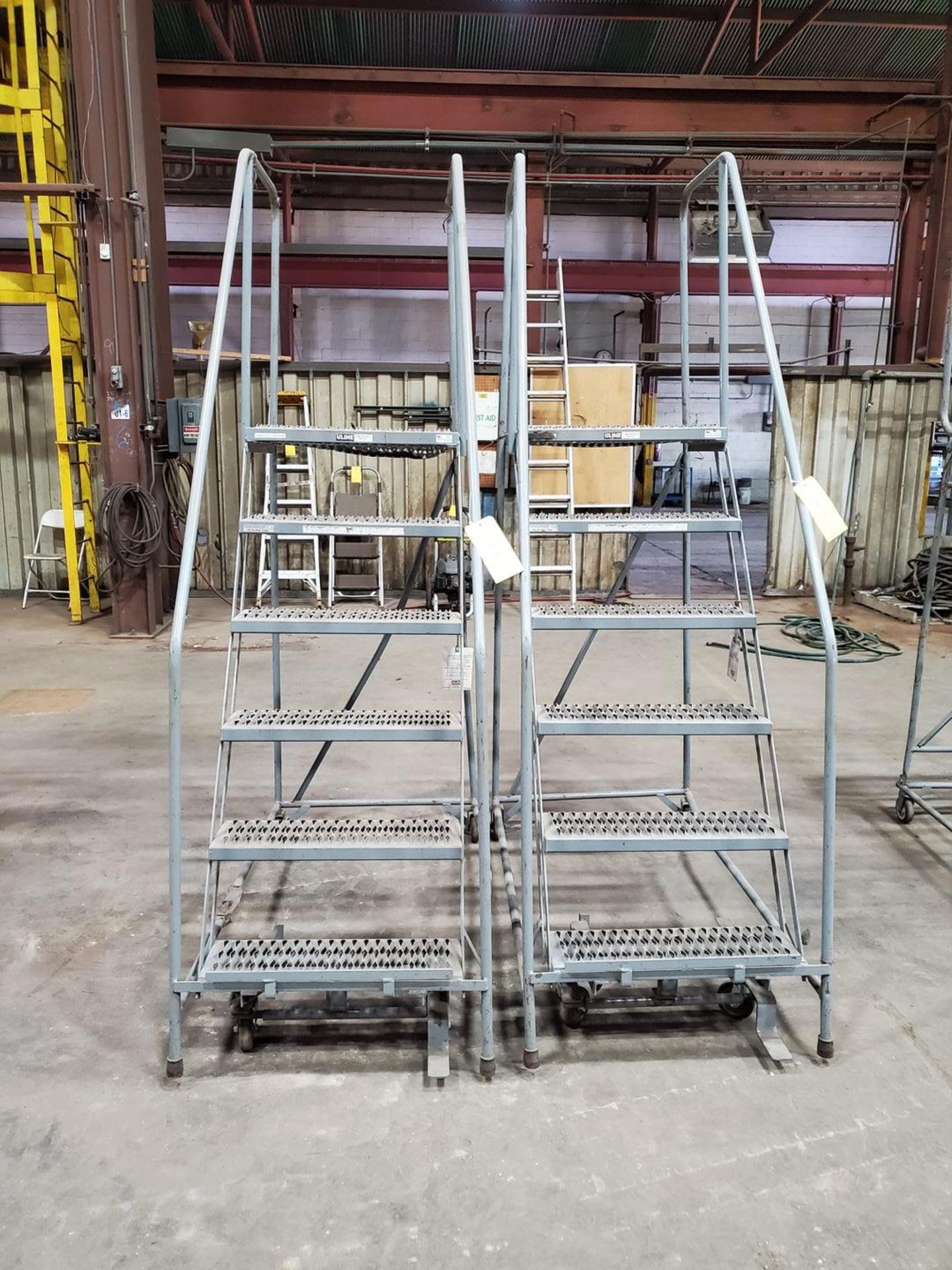 (2) 6-Step Rolling Platform Staircases 450lbs Cap.