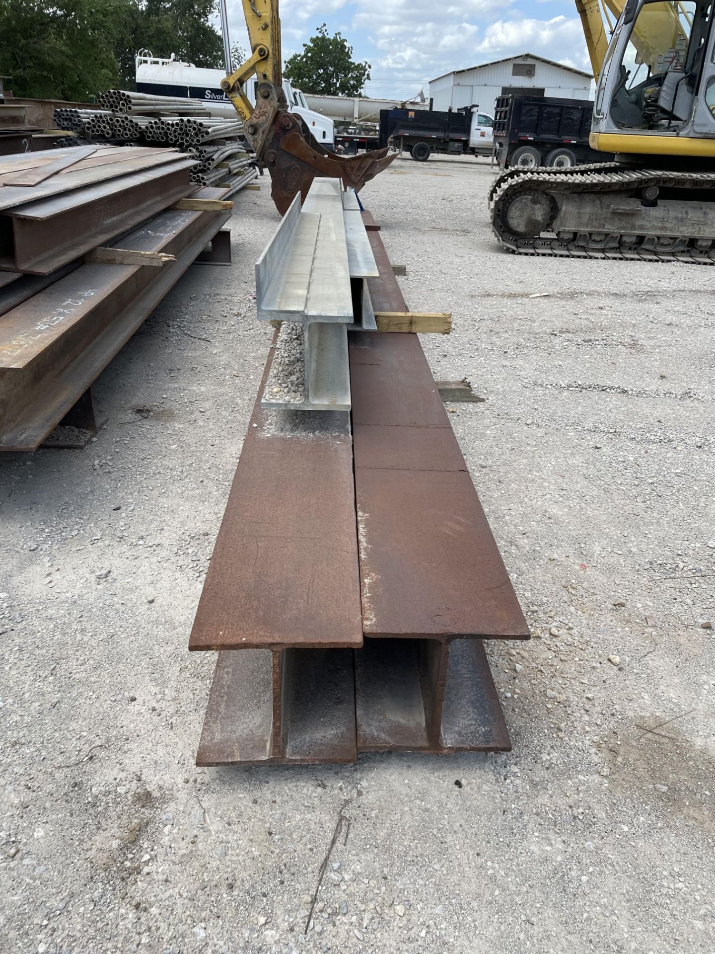 (4) I BEAMS, APPROX: (2) 14" WIDE FLANGE X 30' LONG, (1) GALVANIZED 10" WIDE FLANGE X 16' LONG, (1 - Image 2 of 4