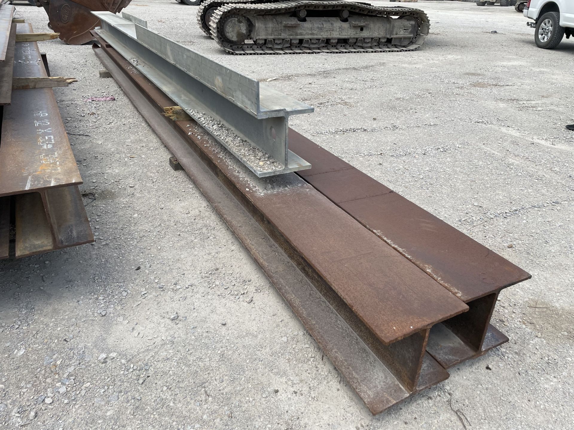 (4) I BEAMS, APPROX: (2) 14" WIDE FLANGE X 30' LONG, (1) GALVANIZED 10" WIDE FLANGE X 16' LONG, (1 - Image 3 of 4